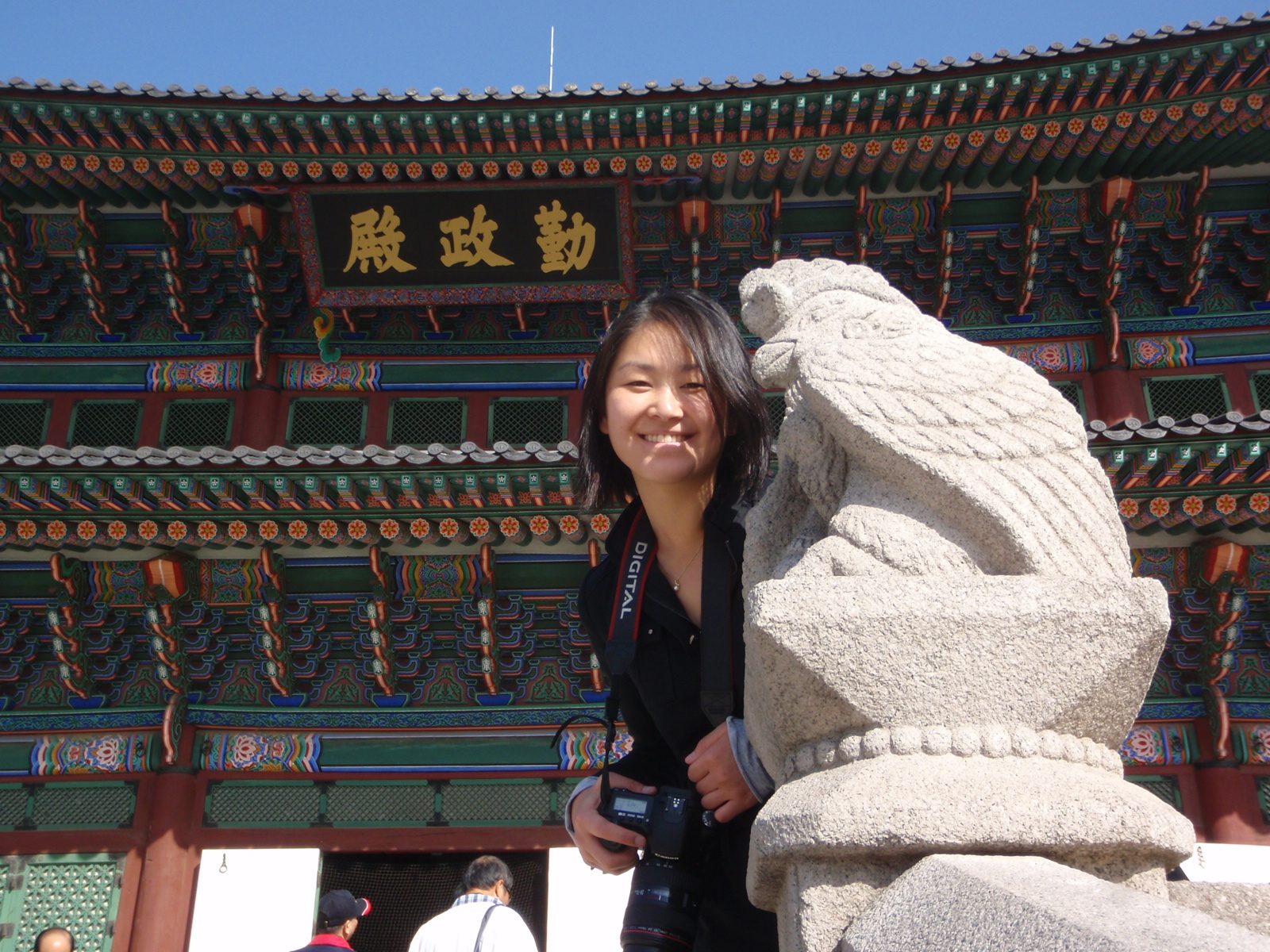 Monica about to be eaten by a gargoyle or something.