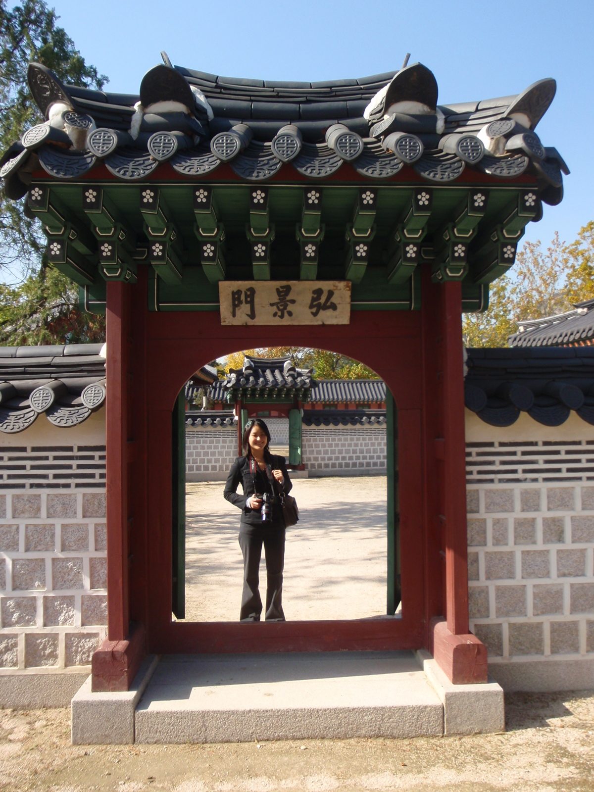 Monica posing in some gateway or another.
