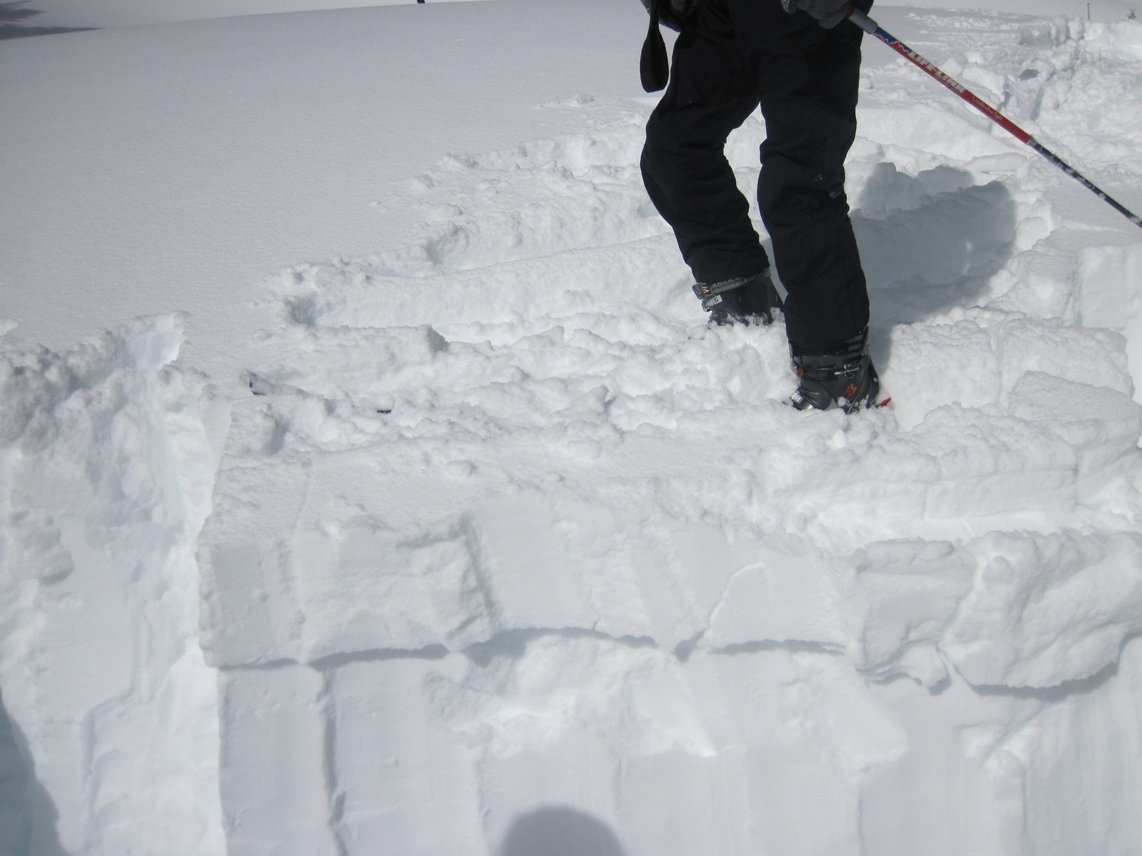 John testing the snow column we dug.