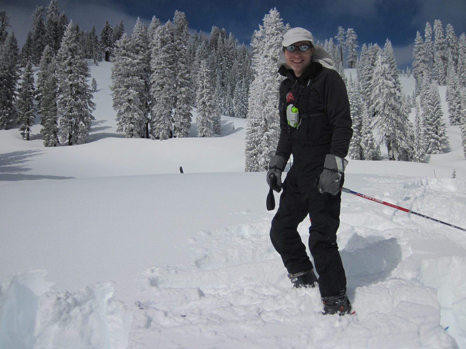 John standing on the snow column to test it for stability.