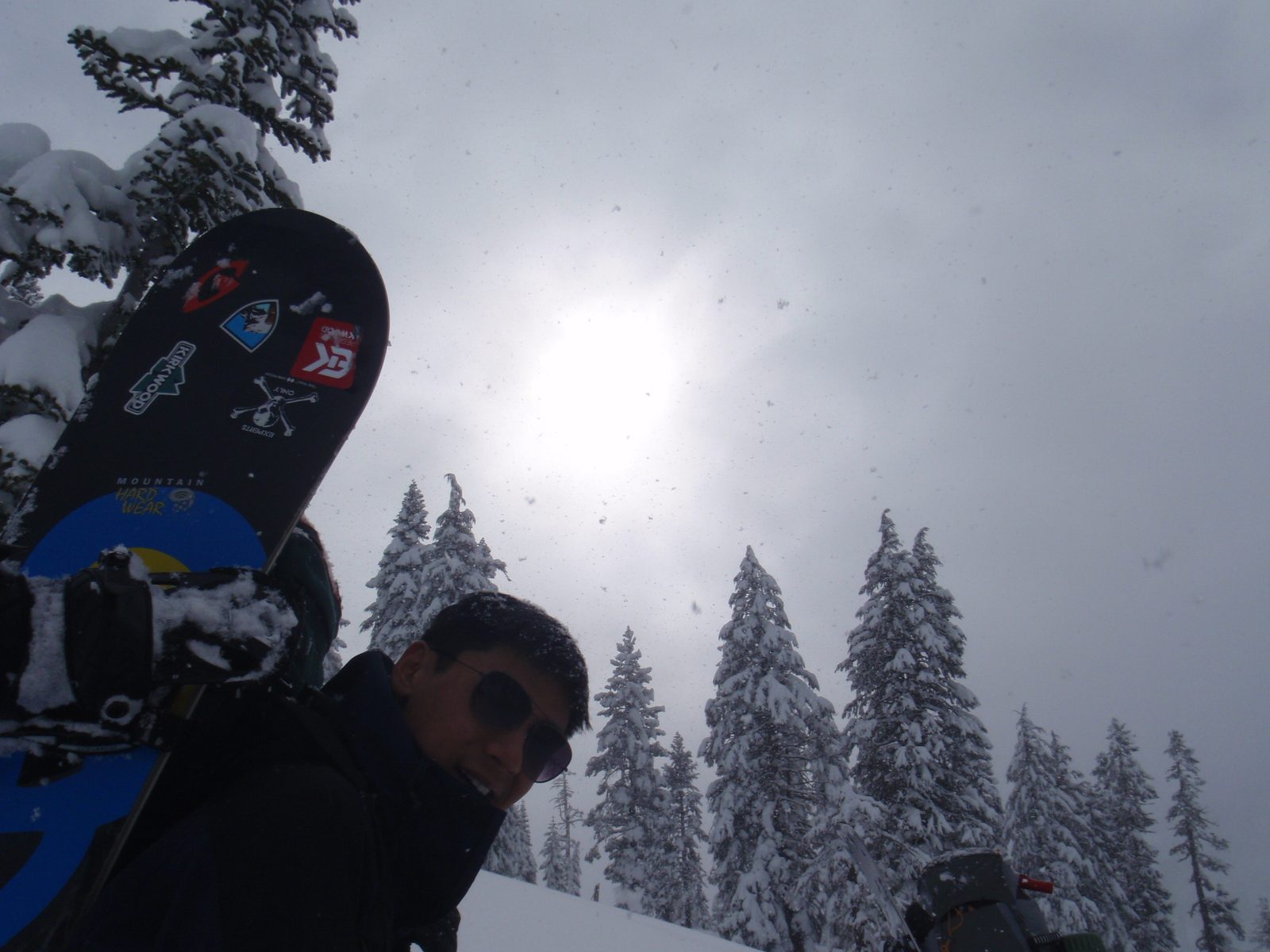 Yang, with snowflakes and sun.