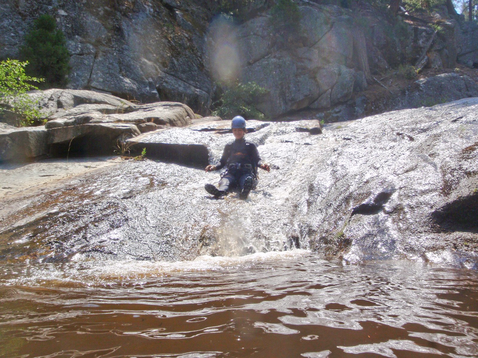 Monica on a water slide in Ten Mile Creek.