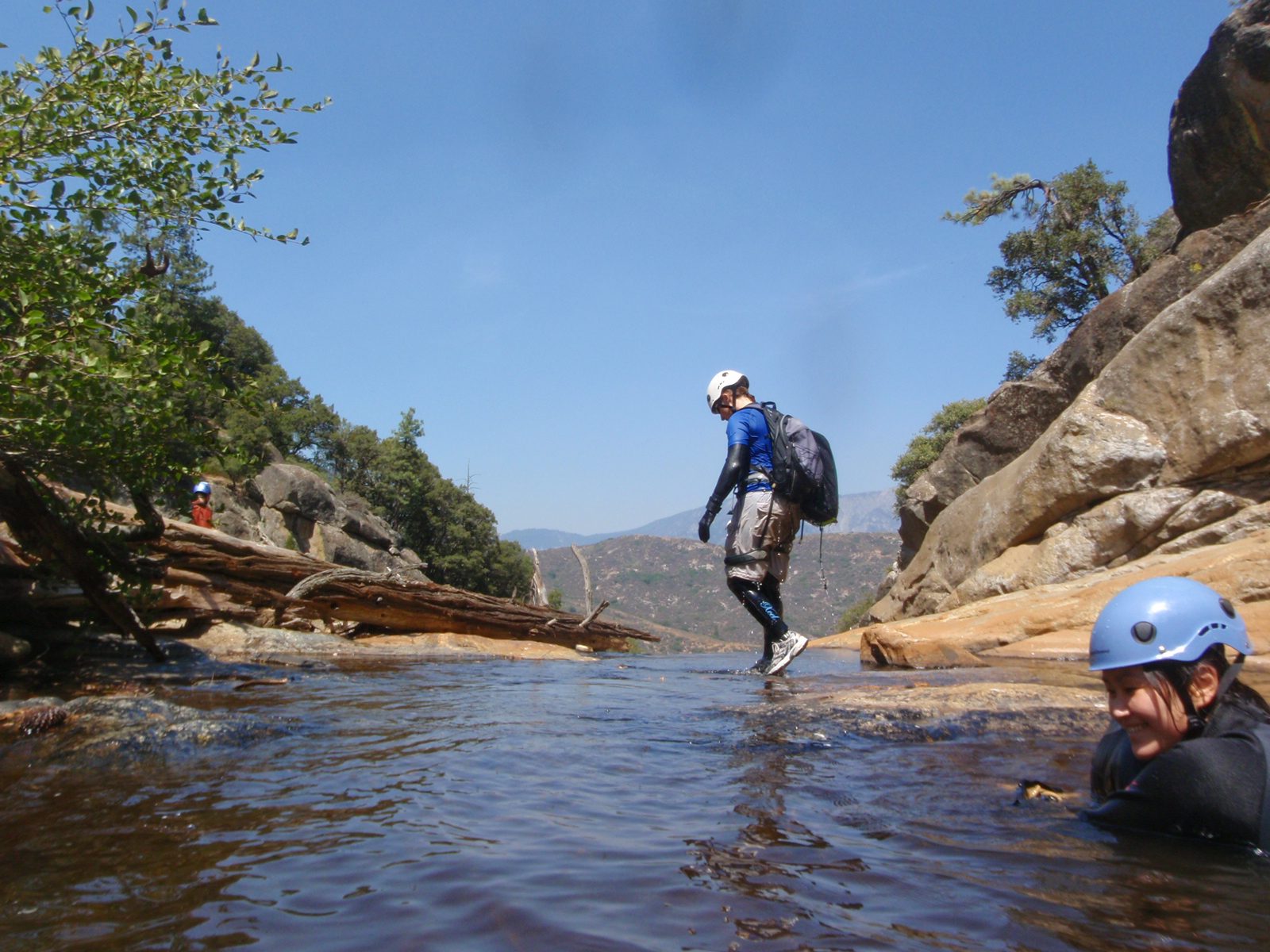 Joel has found the first rappel station and Catherine crosses the river to join him.  Also, it's...