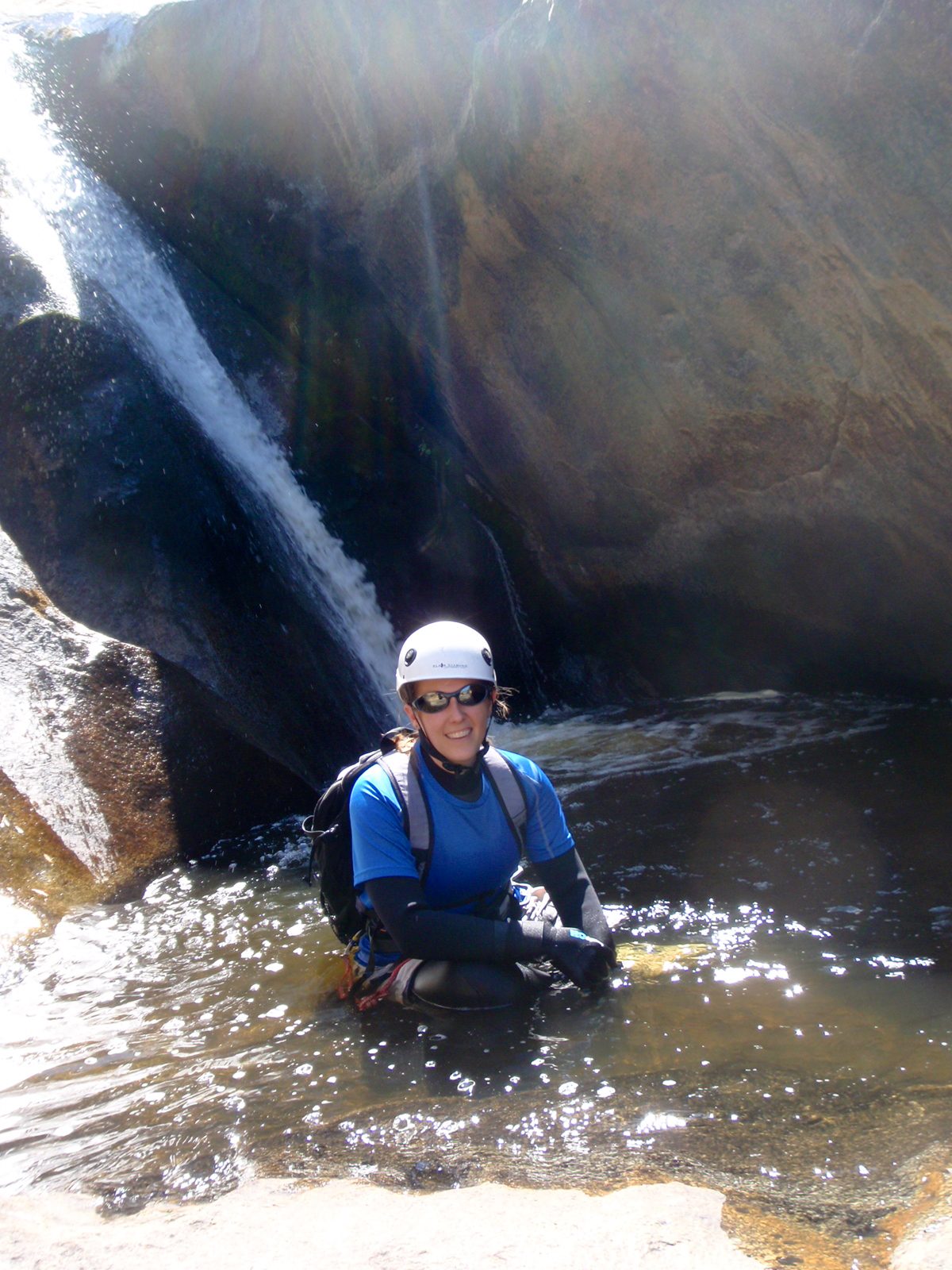Catherine hanging out in a small pool at the base of the second rappel.