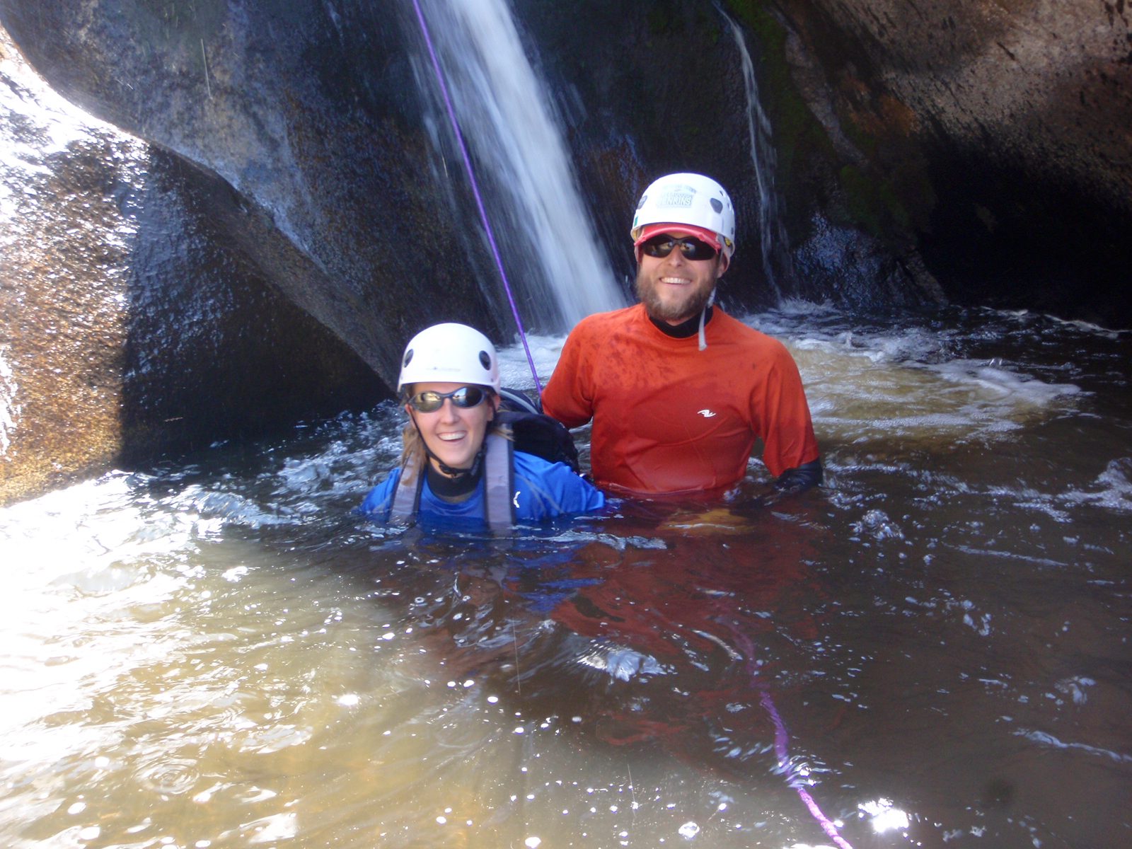 John and Catherine at the bottom of the second rappel.  Catherine keeps slipping on the slimy...