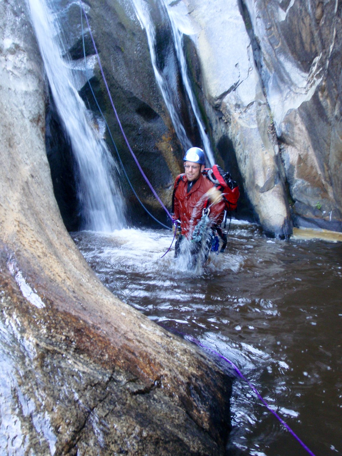 Joel at the bottom of the third rappel.