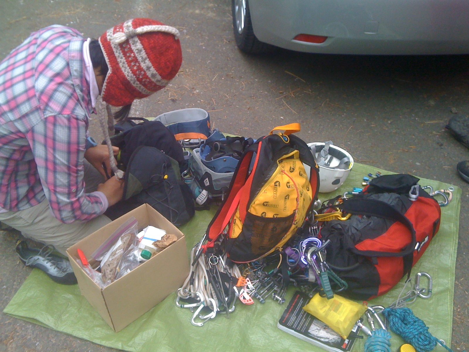 Monica sorting gear in the parking lot Sunday morning.
