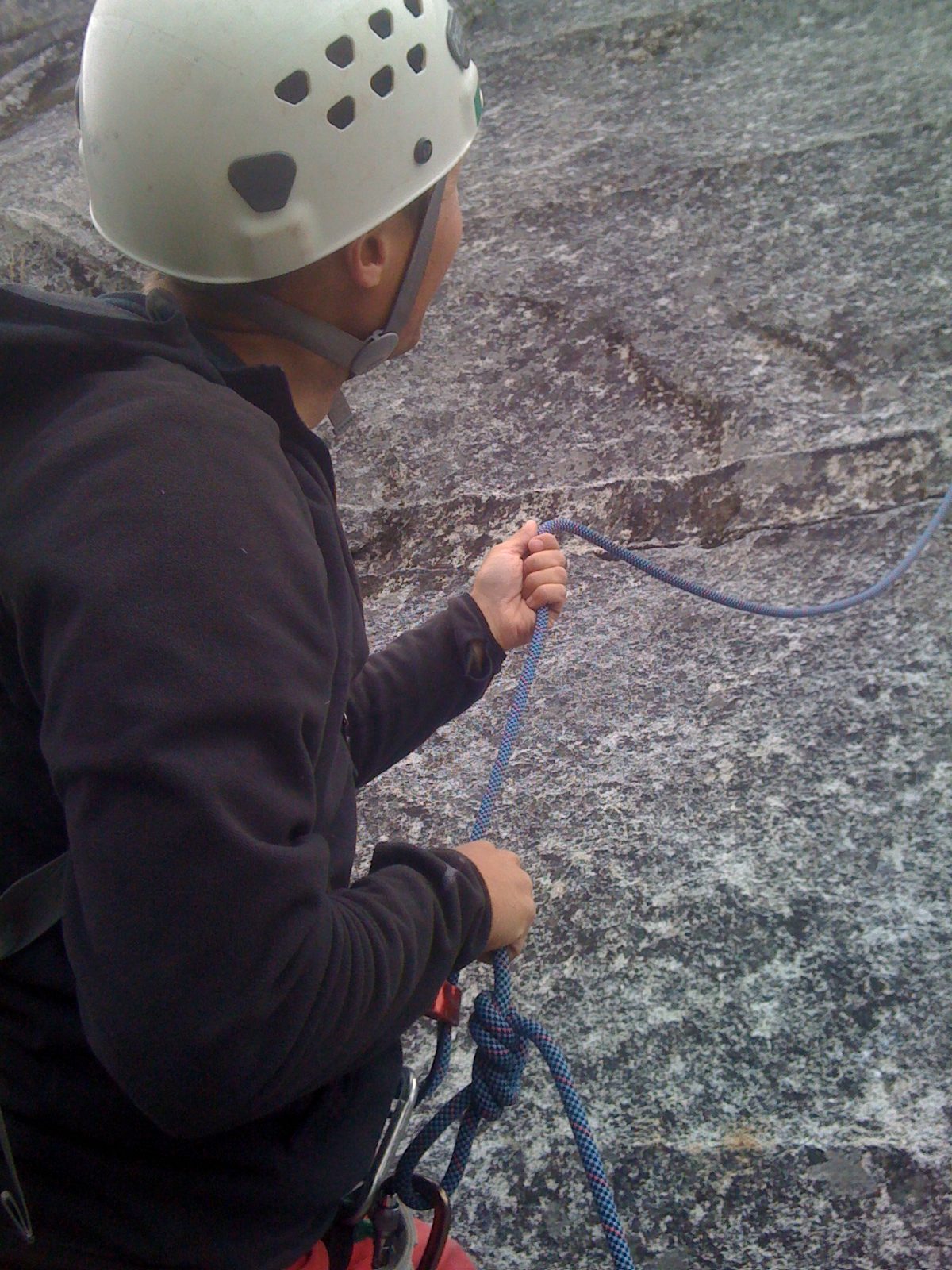 John feeding out the last foot of slack for Monica on lead. We used a single 60 meter rope for...