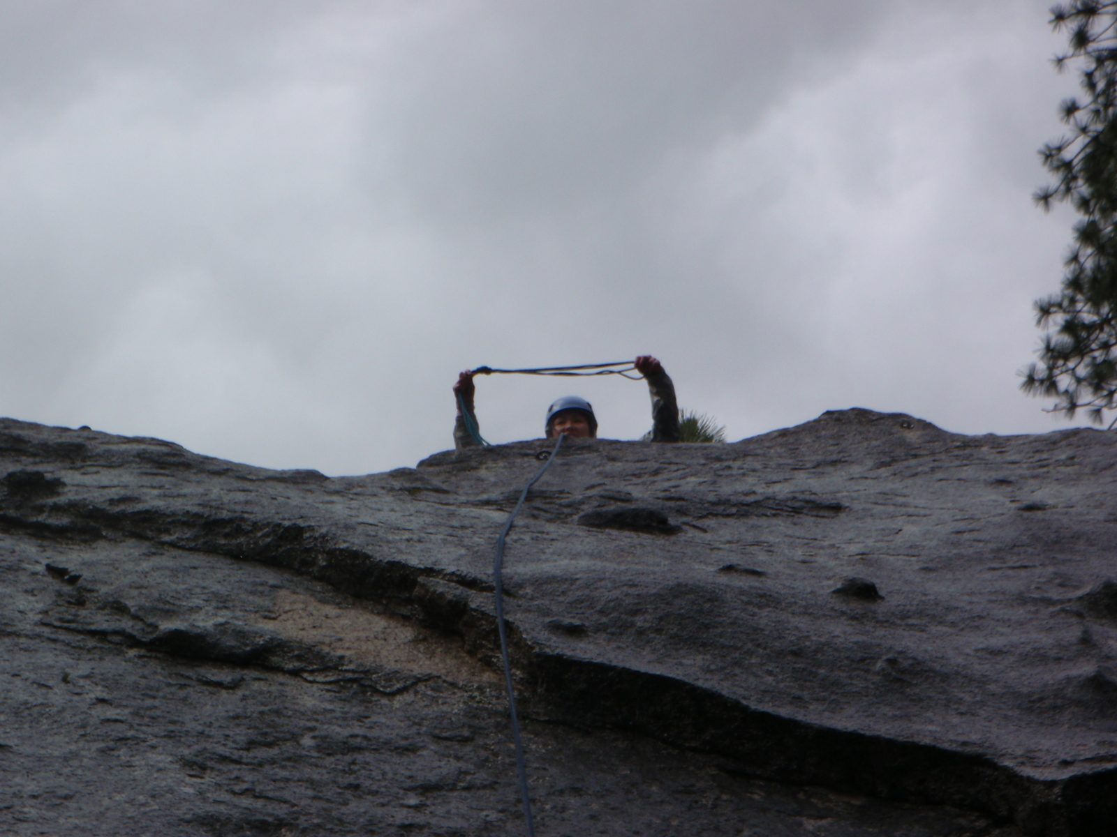 Monica, having climbed a 5.6 in the rain on Dental Wall at Sugarloaf.