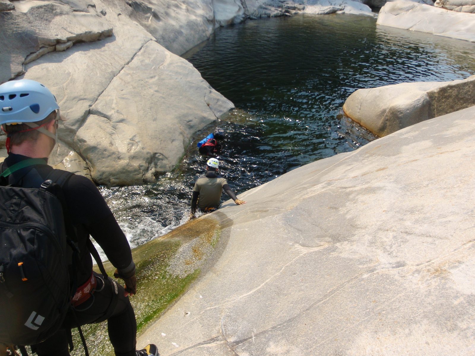 Another water slide!  Mike looks on as Andy takes the plunge.