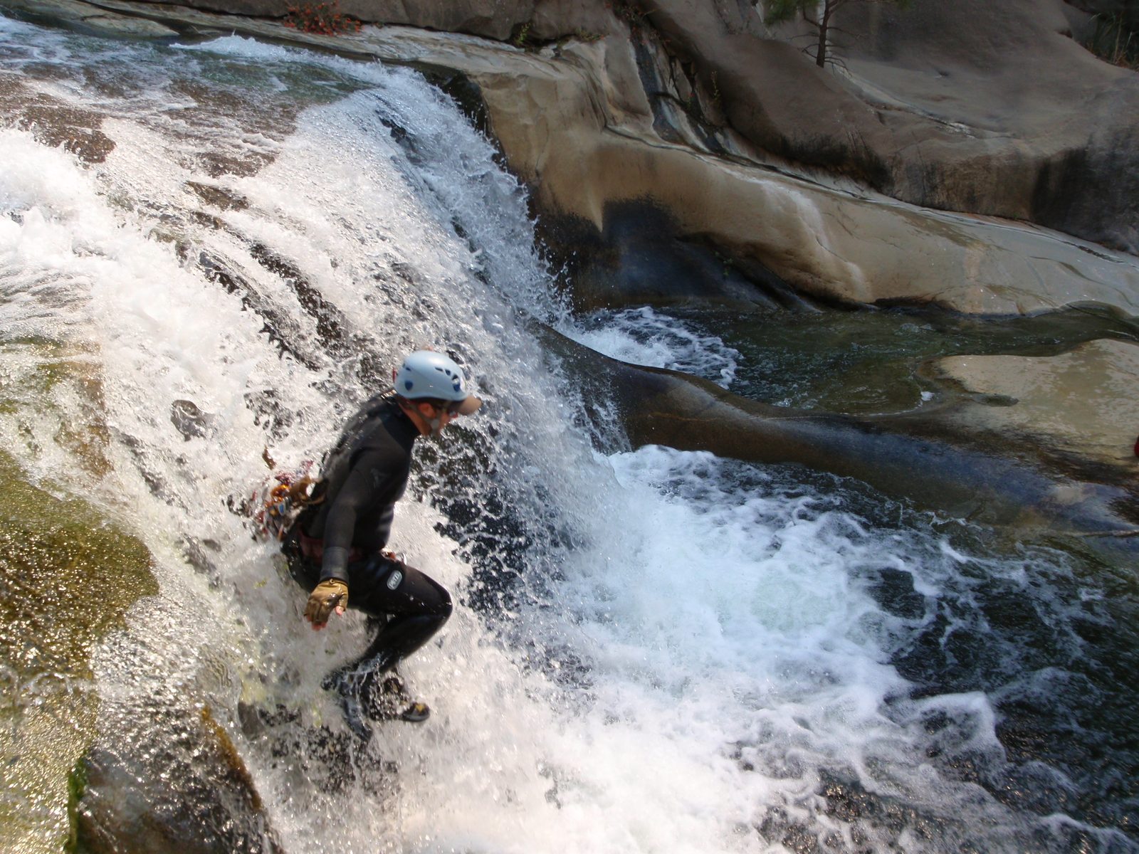 Mike, caught in mid air as he slides off a short waterfall (on purpose).