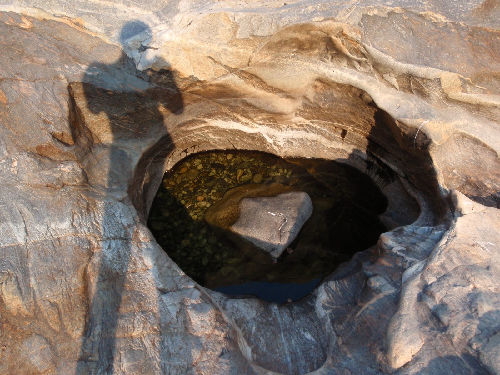 A little pot hole, with my reflection.