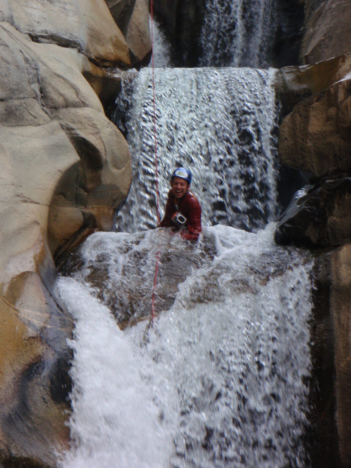 Joel having fun in the waterfall.