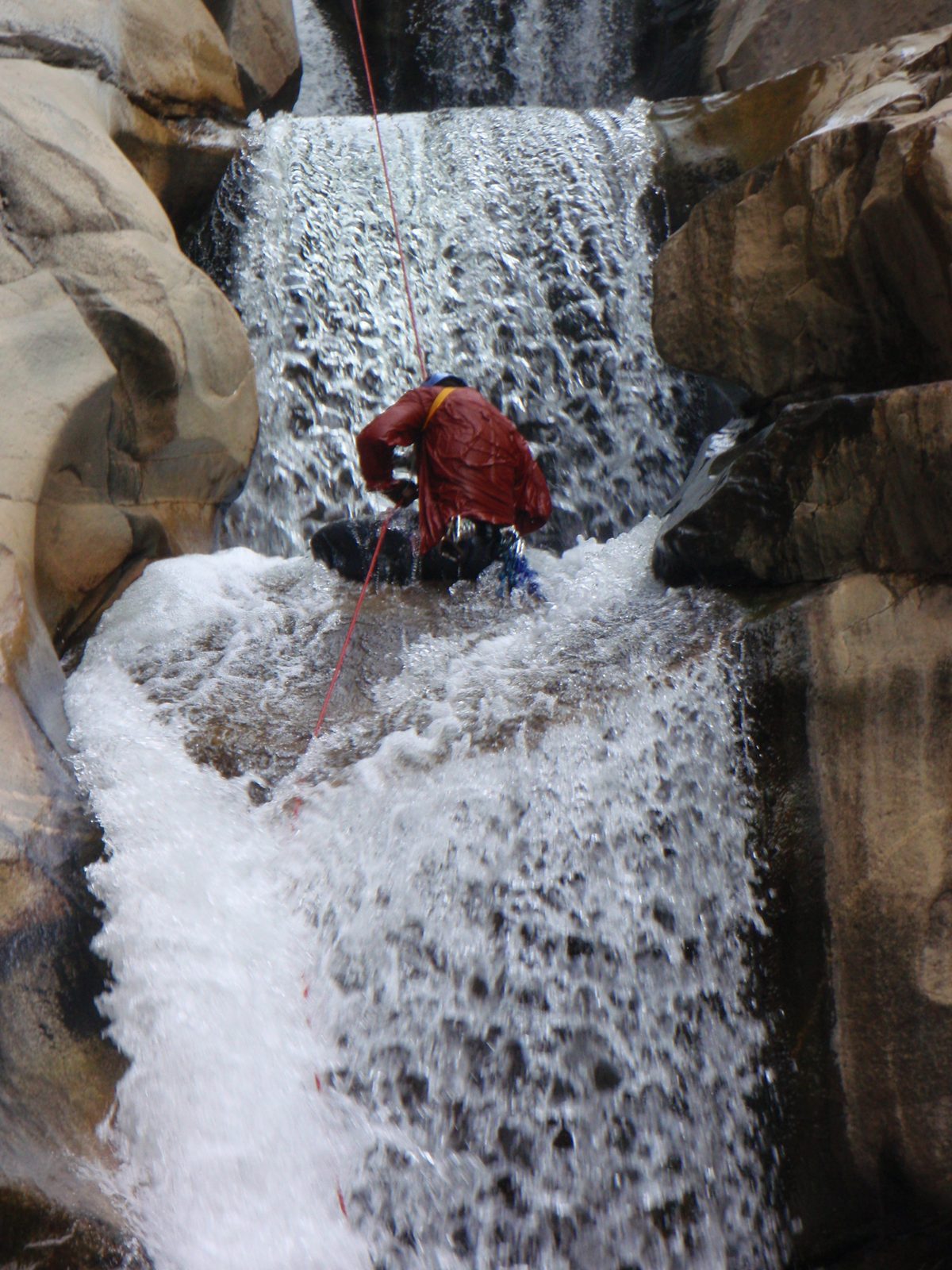 Joel, dropping into the second section of the waterfall