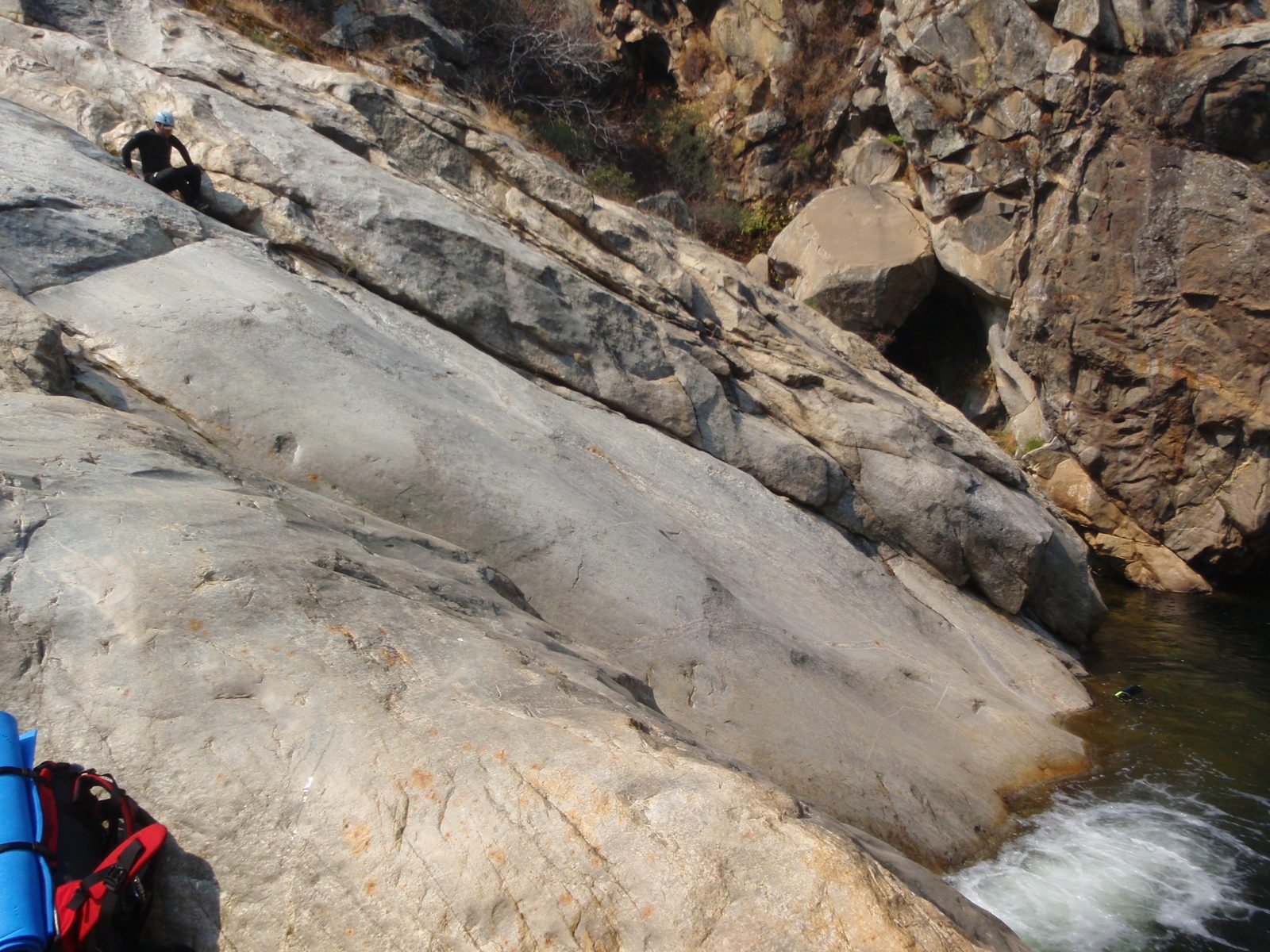 Mike (top left) doing one of his patented "power slides" down dry, smooth rock.