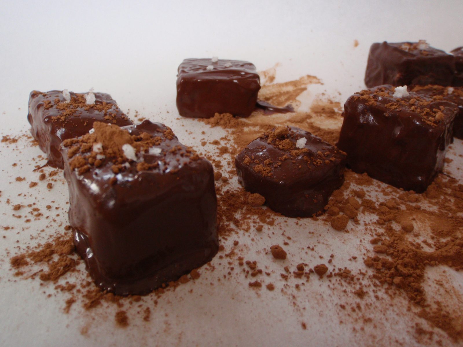 More dark-chocolate covered caramels with cocoa powder and fleur de sel.