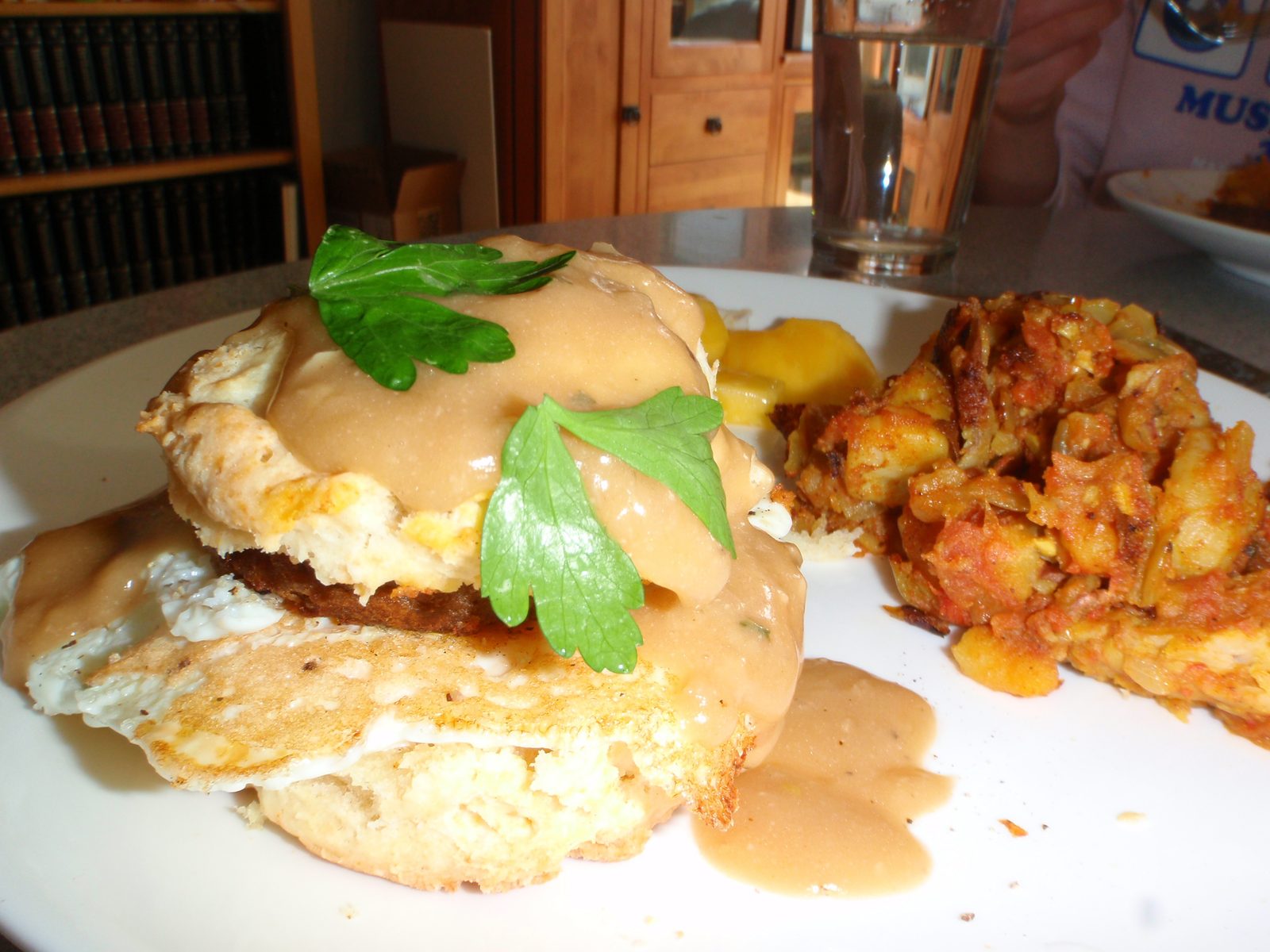I made vegetarian breakfast sandwiches for breakfast: homemade biscuits, fried egg, morningstar...