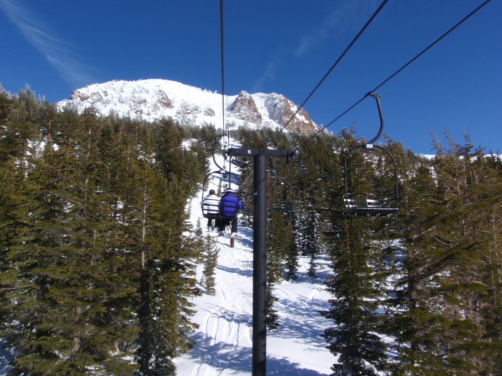 Riding Chair 14 up the backside of Mammoth alone.  First impression of Mammoth over Tahoe: the...