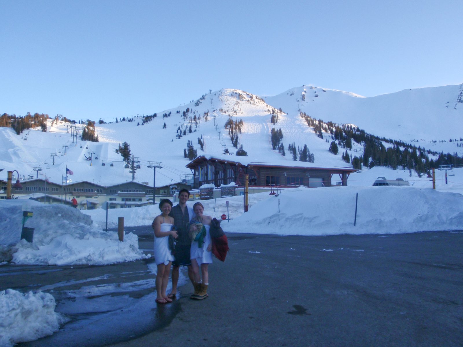 Monica, Walter, and Alexandra pose for the camera while trying not to look cold.