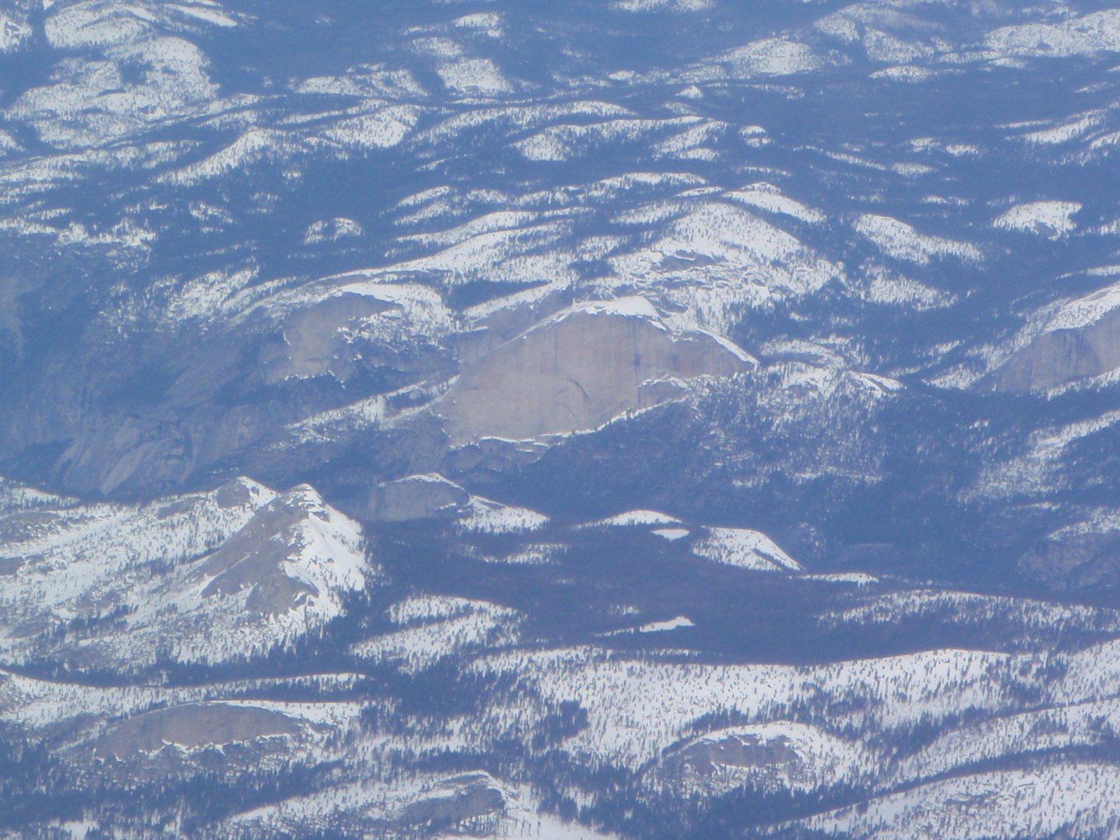 As luck would have it, our flight path took us just south of Yosemite Valley, and since we were...