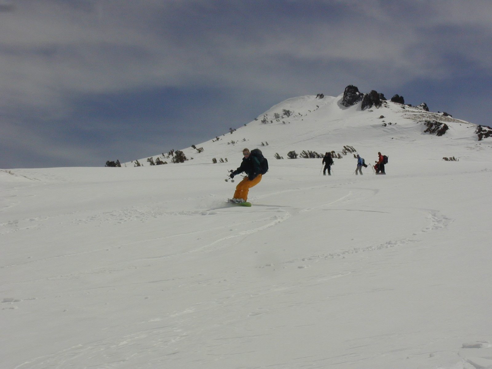 Catherine rippin' it up into the Truckee River box canyon while Peter and Rachel and two others look on.