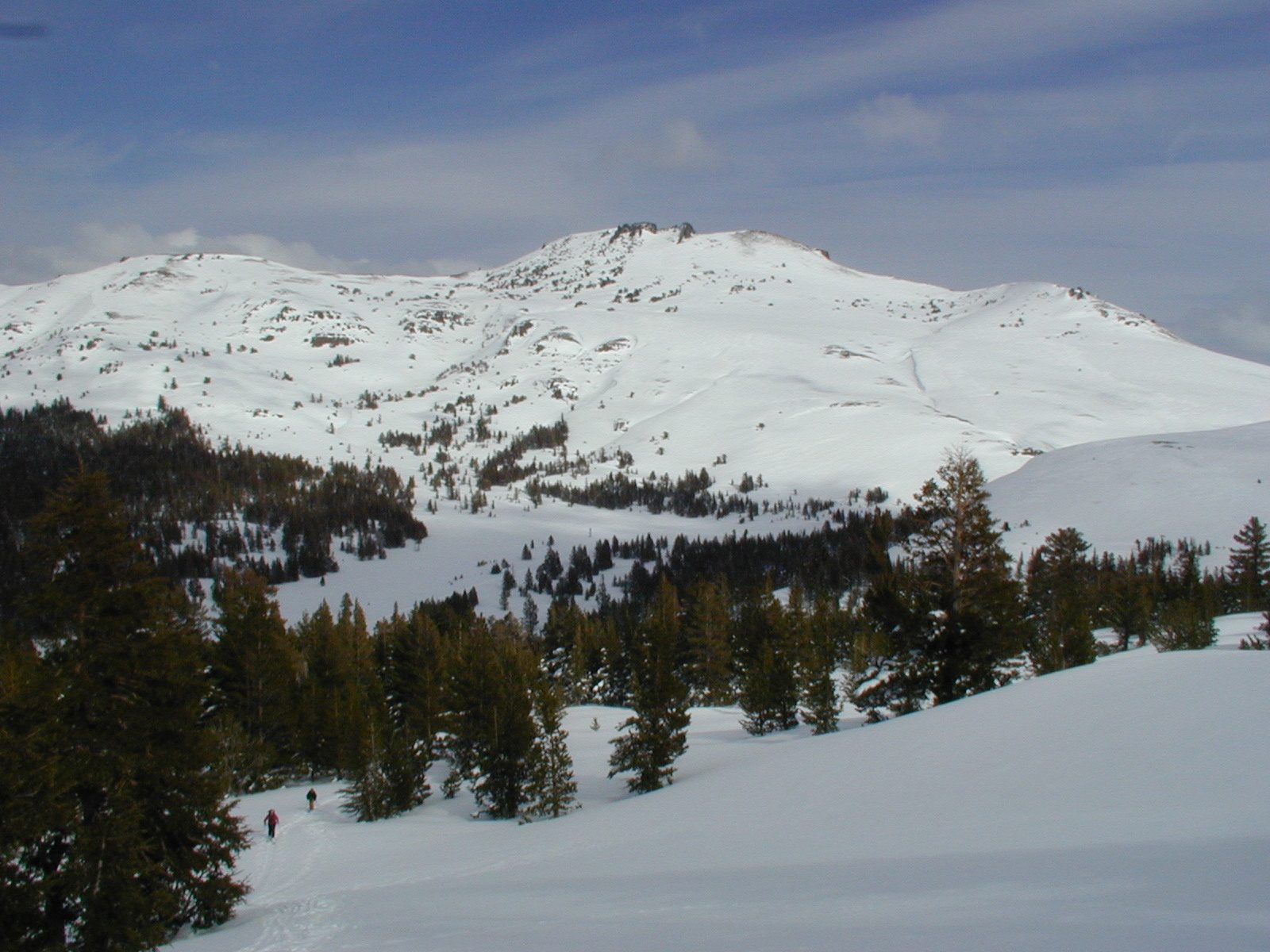 Red Lake Peak, with Catherine and Tom trudging upward in the foreground.
