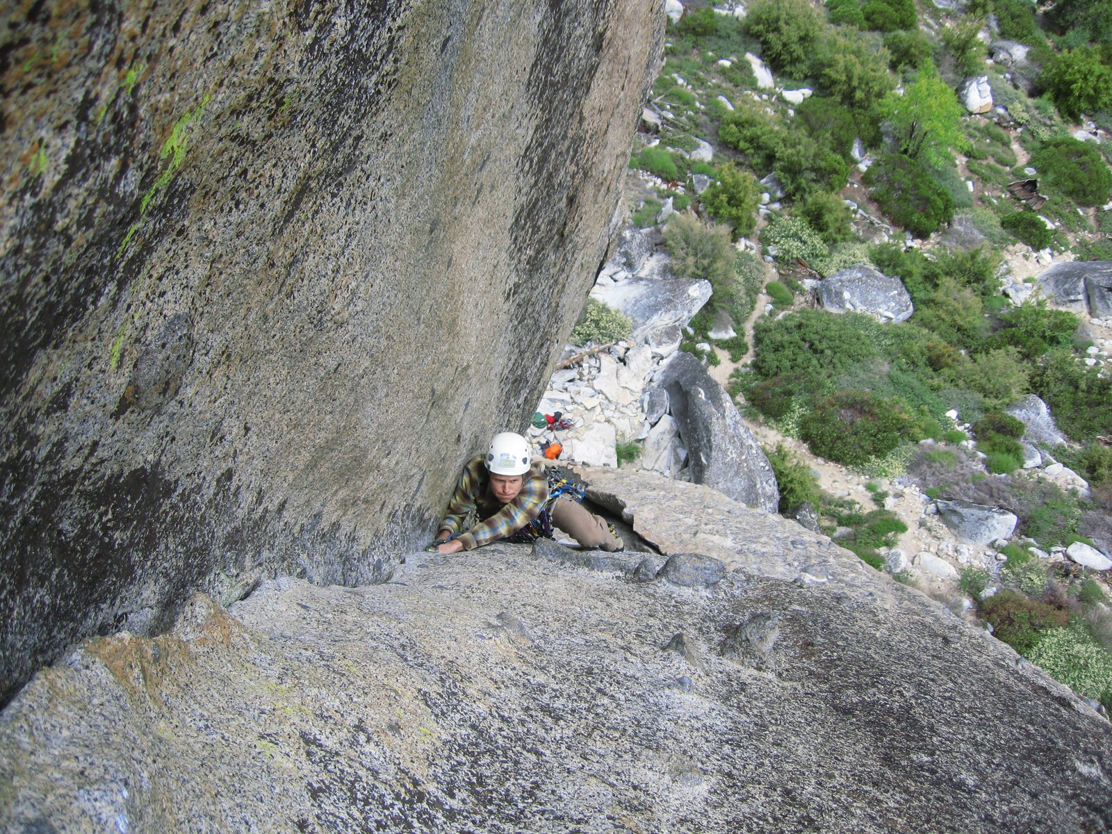 John pulling the roof on pitch 2 of Fear of Flying (5.9) at Phantom Spires, CA. Photo by Brian Schuster.