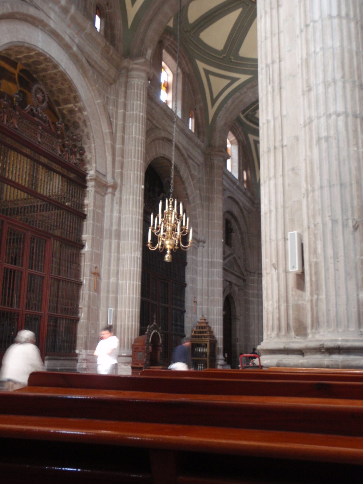 You can see how much the church is leaning by comparing the chandelier cord to the columns