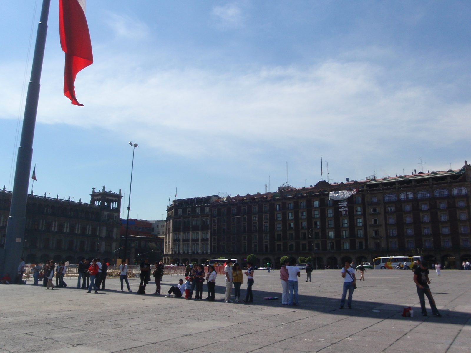 Heh.  No one wanted to stand in the sun apparently.  They are all standing in the shade of the...