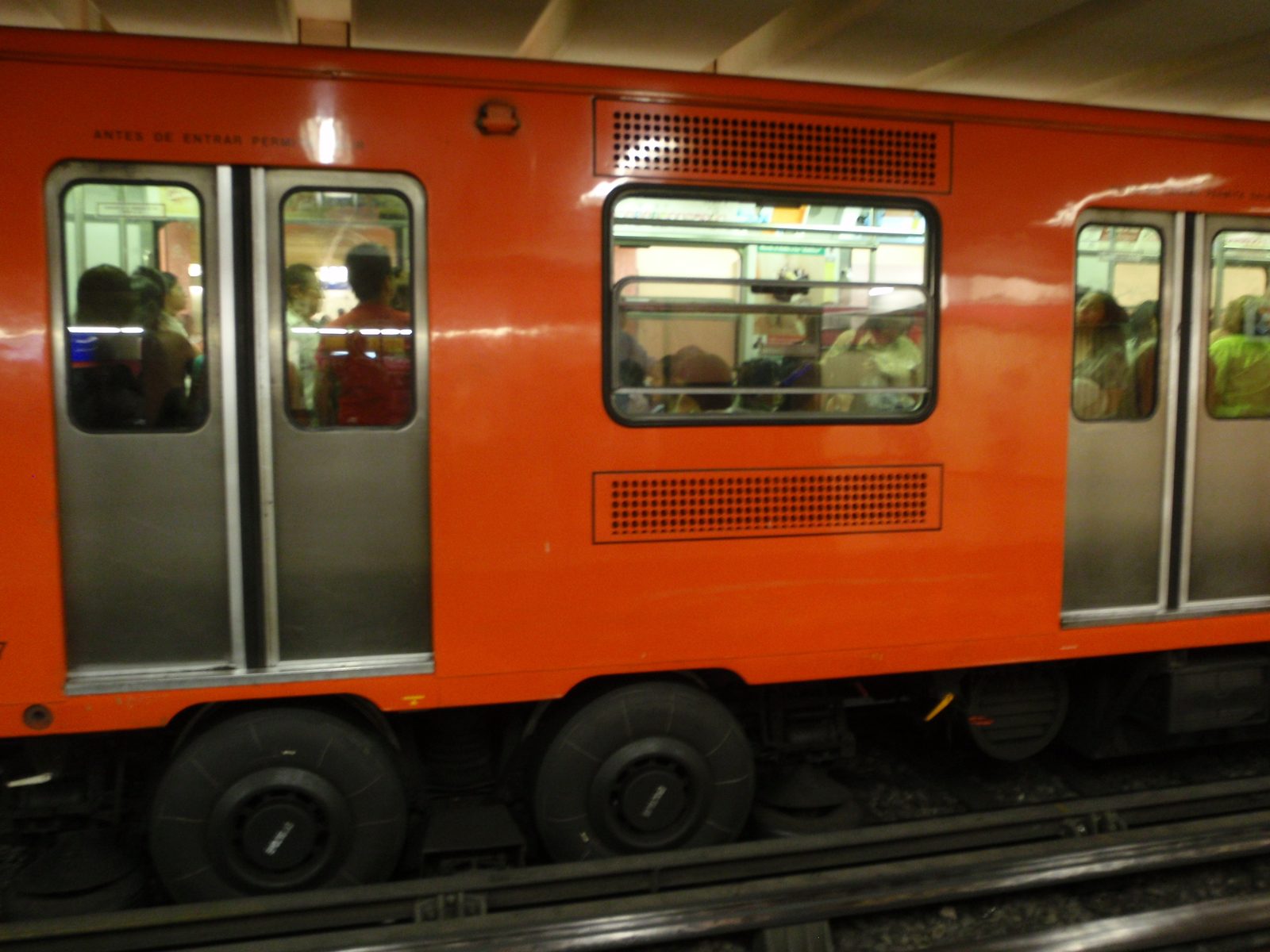 All-woman subway car.  The Mexico City metro has rubber wheels, which makes it pretty quiet.  Neat.