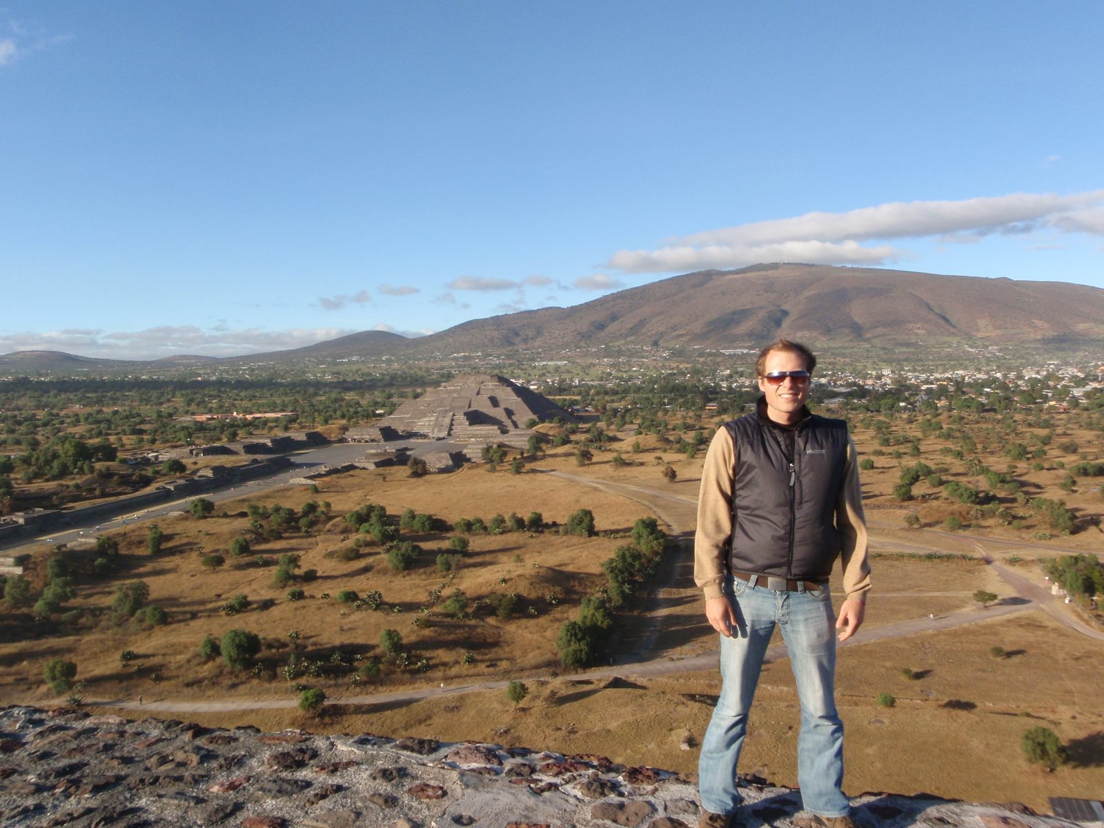 John, with the Pyramid of the Moon in the background.  It was very, very windy.