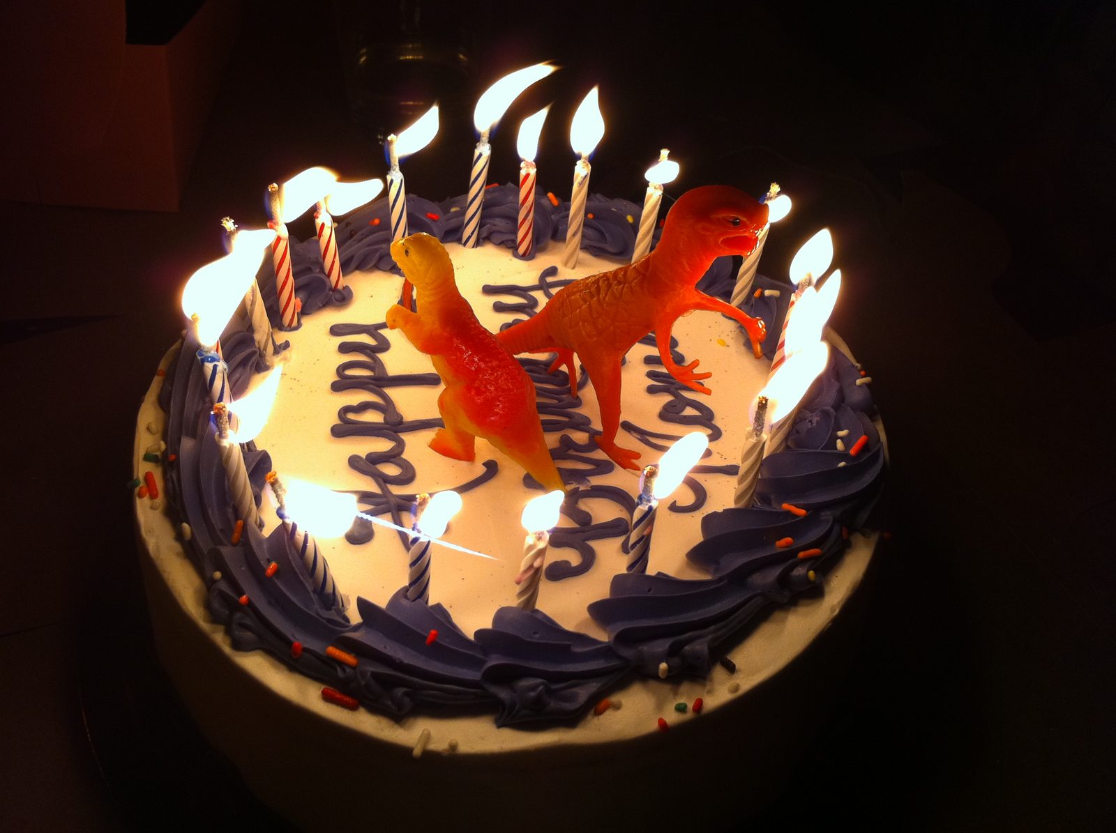 Jasper bought the plastic dinosaurs at a dollar store, along with the truck candles. The ice...