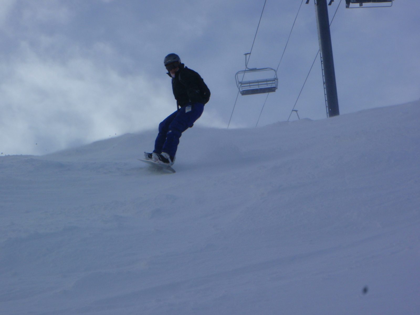 Catherine ripping it up under Lone Tree lift at Moonlight Basin.
