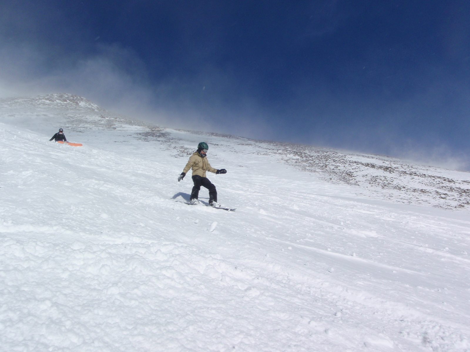 Monica riding down from the top of Lone Mountain.