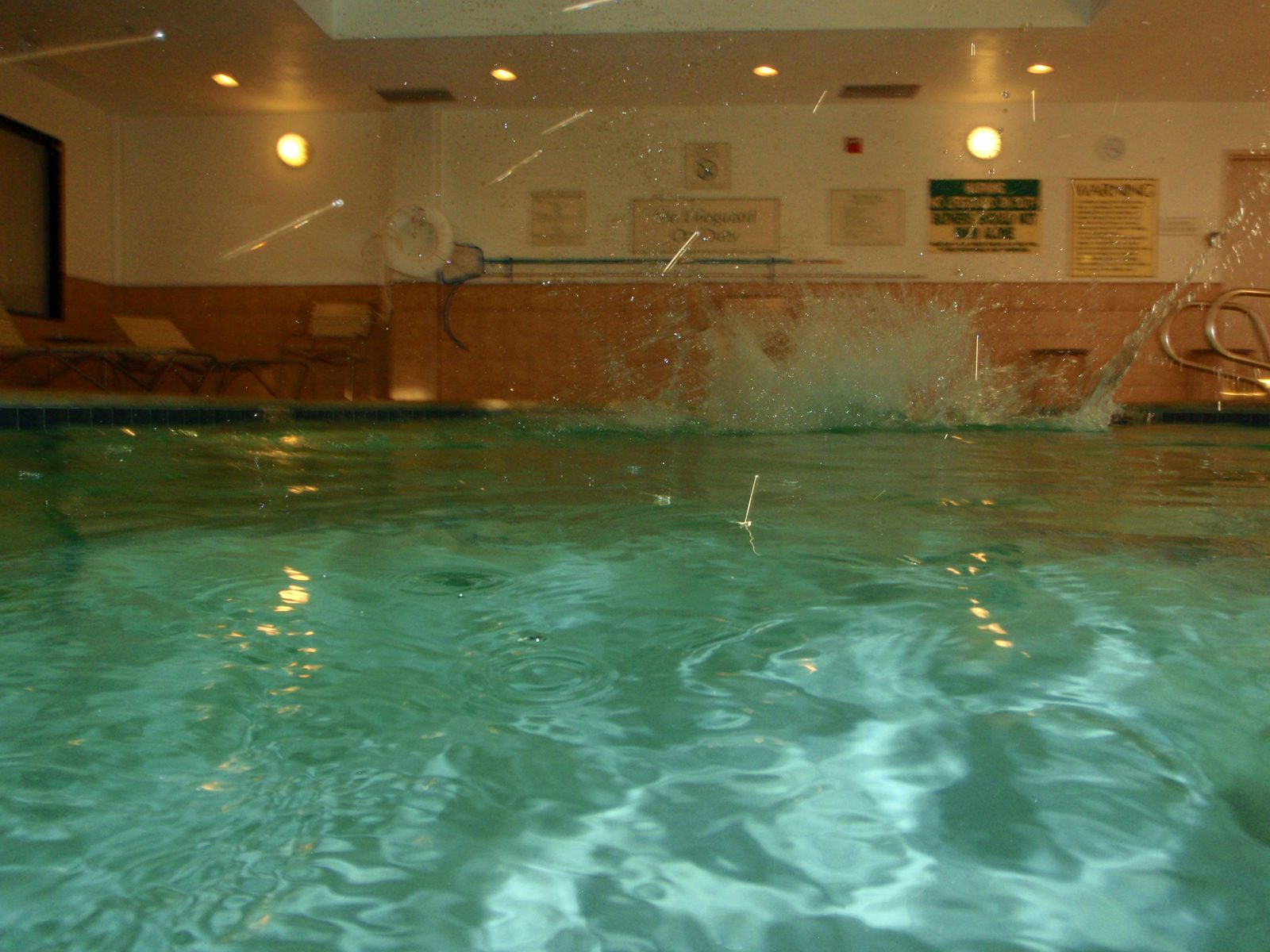 Jay jumping into the hotel pool.