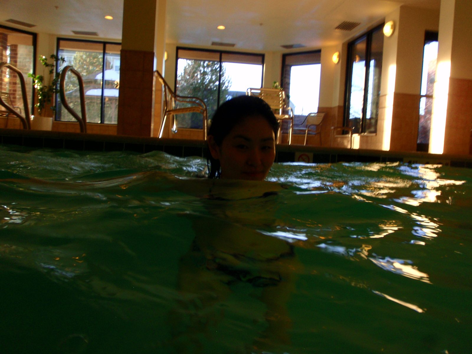 Monica swimming with her mouth shut, for good reason.  There were many signs on the wall...