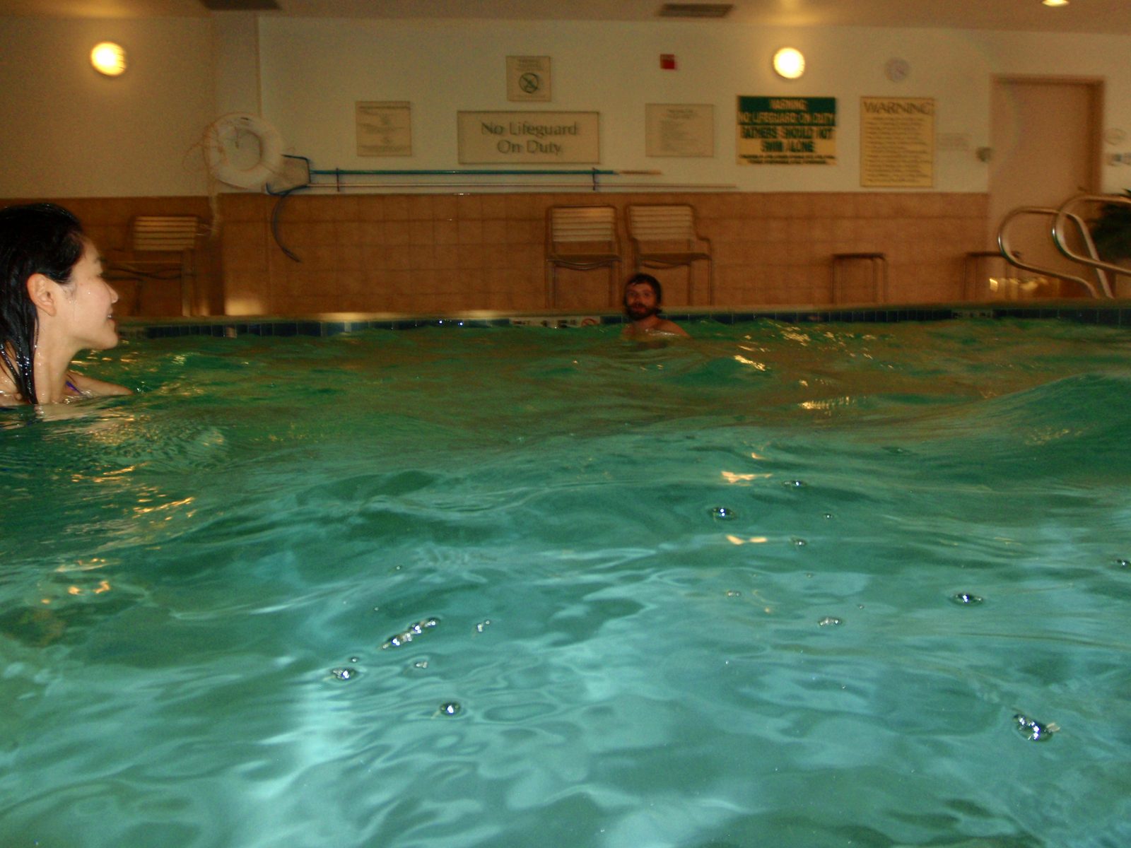 Jay and Monica swimming.