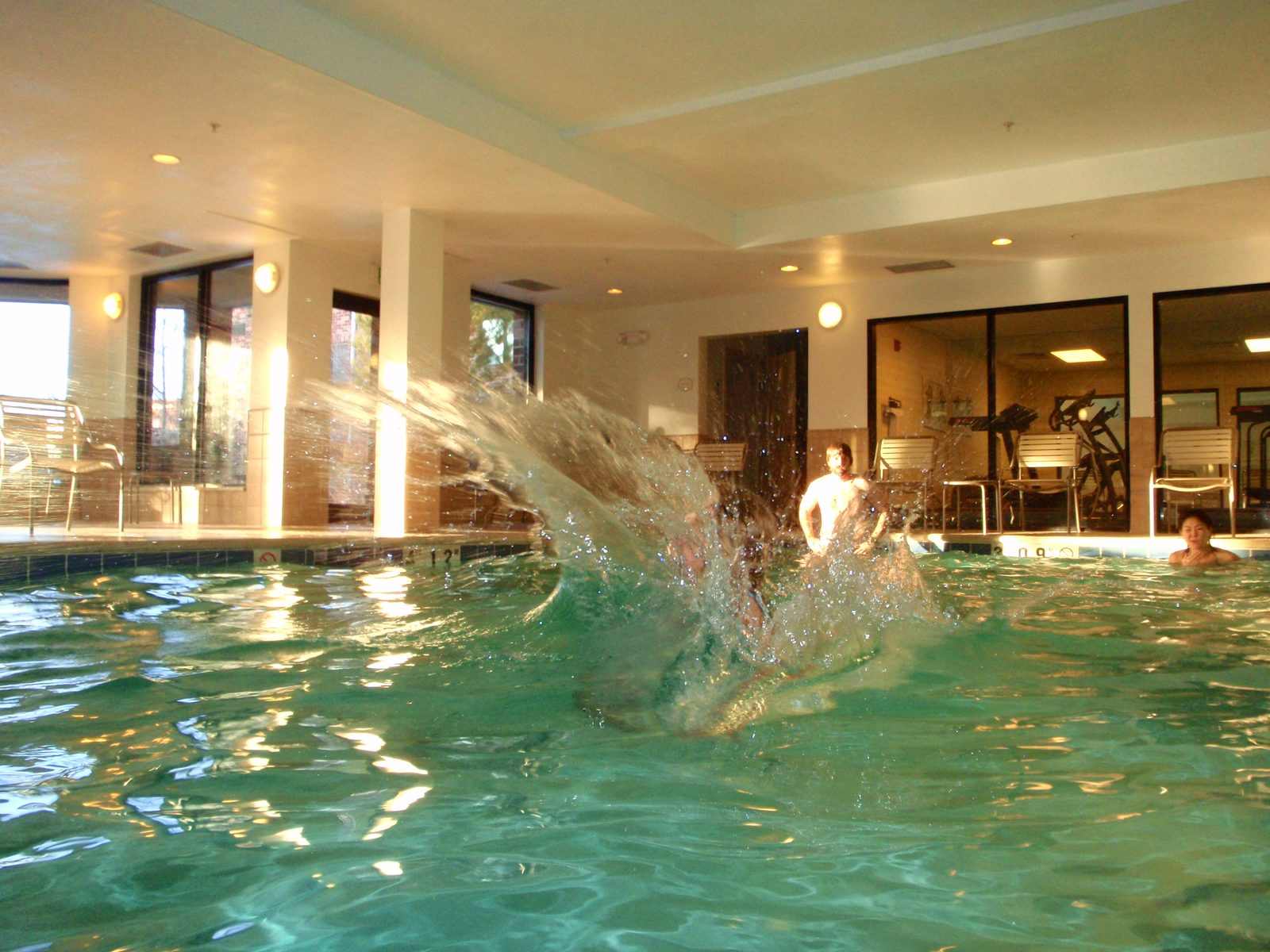 John jumping into the pool.