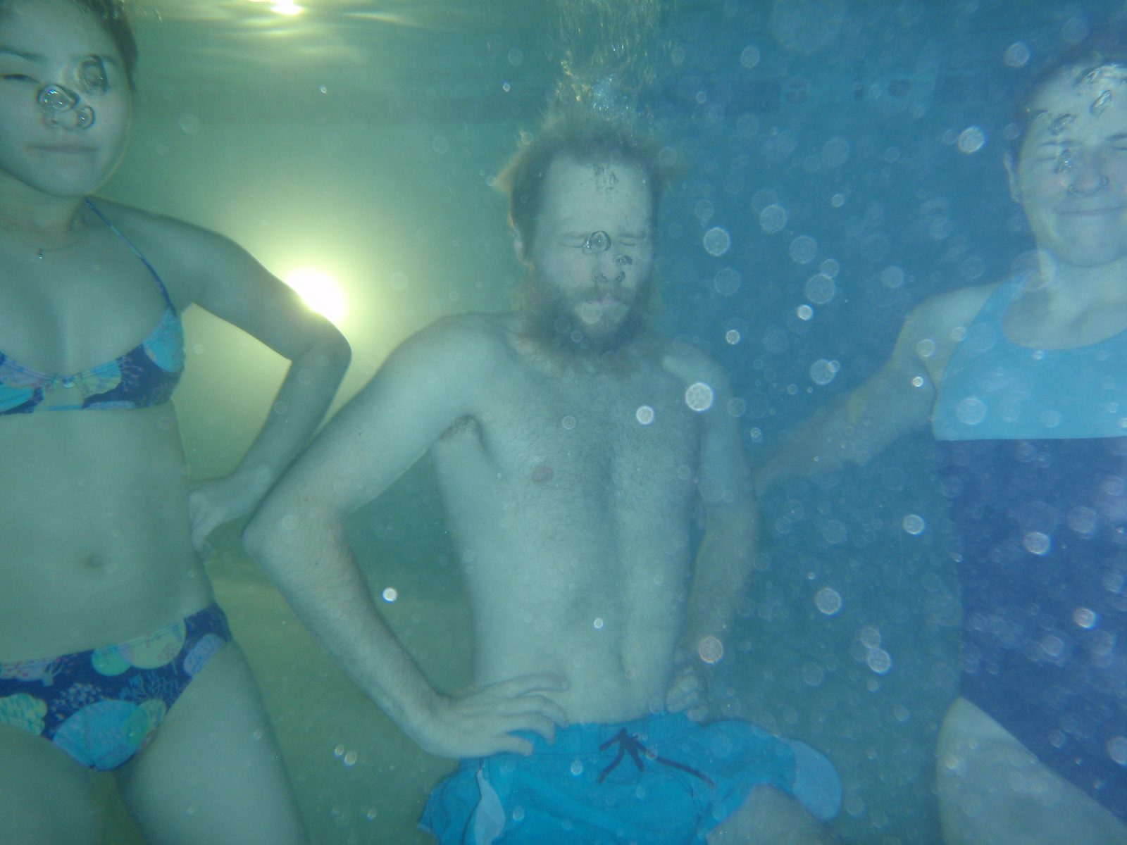 Monica, John, and Catherine underwater.