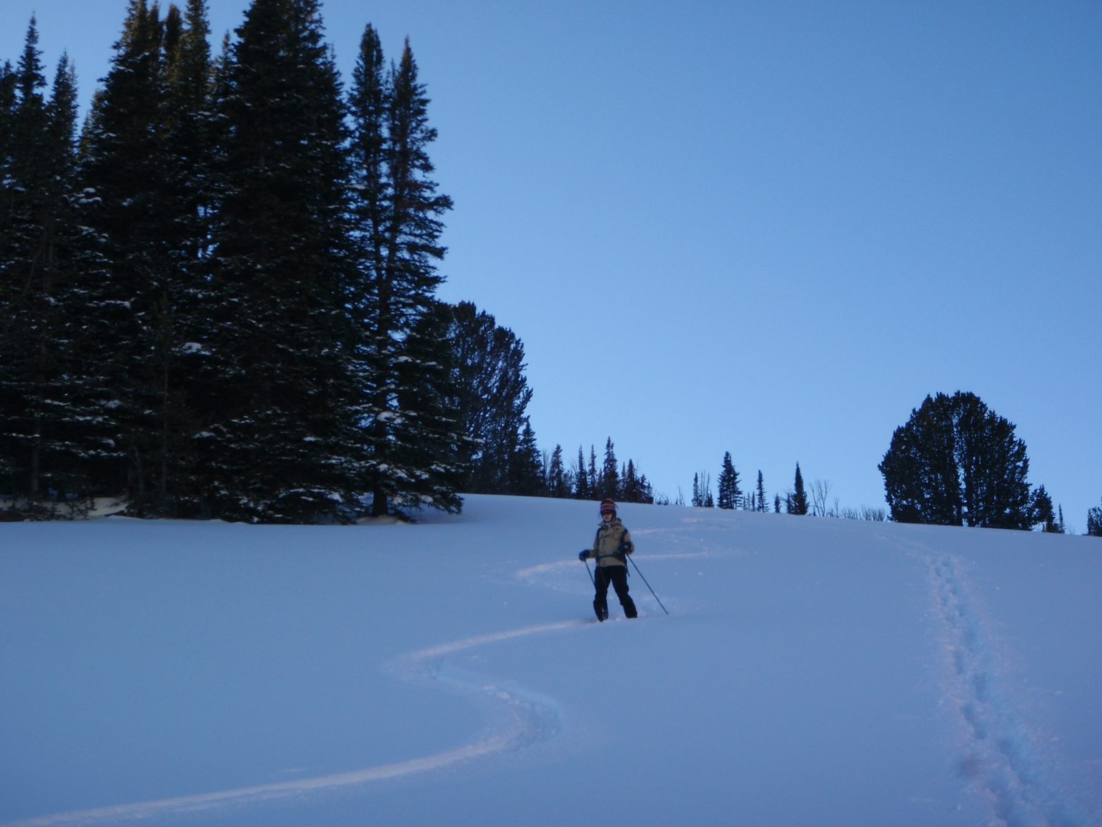 Monica going down the ski trail pretending she's a skier.