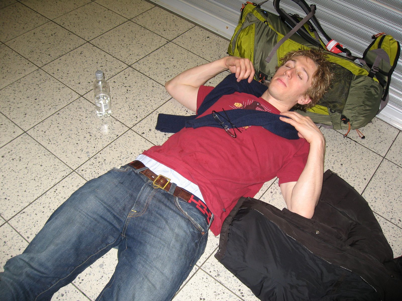 Trevor sleeping in Luton (London airport) before the 6am Ryanair departure to Marrakech.