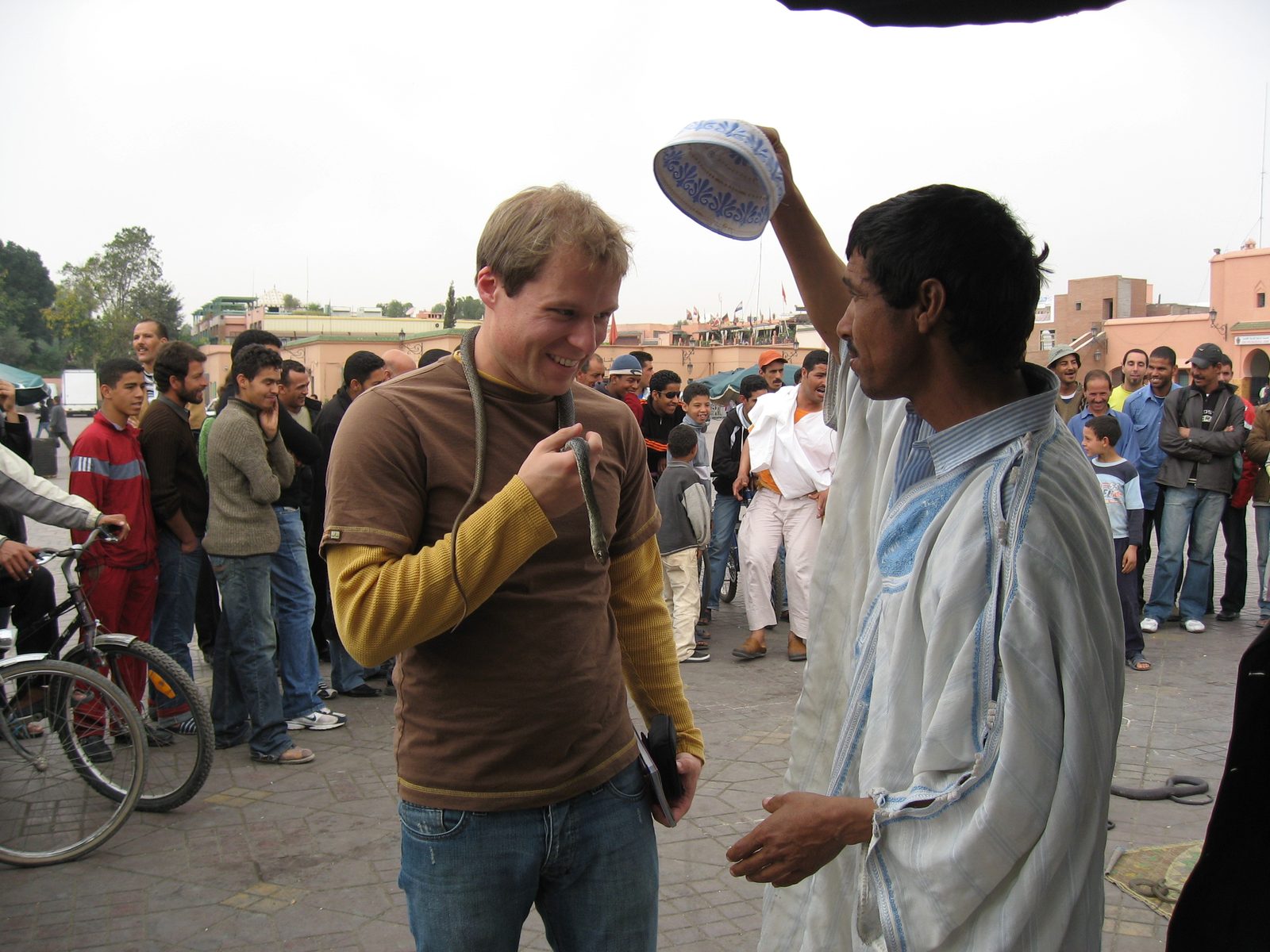 John with a snake charmer outside the souks in Marrakech.