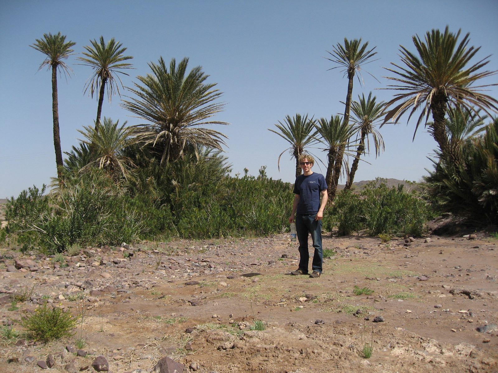 Trevor standing near a small desert Oasis just south of Ourzazate on the road to Agdz...