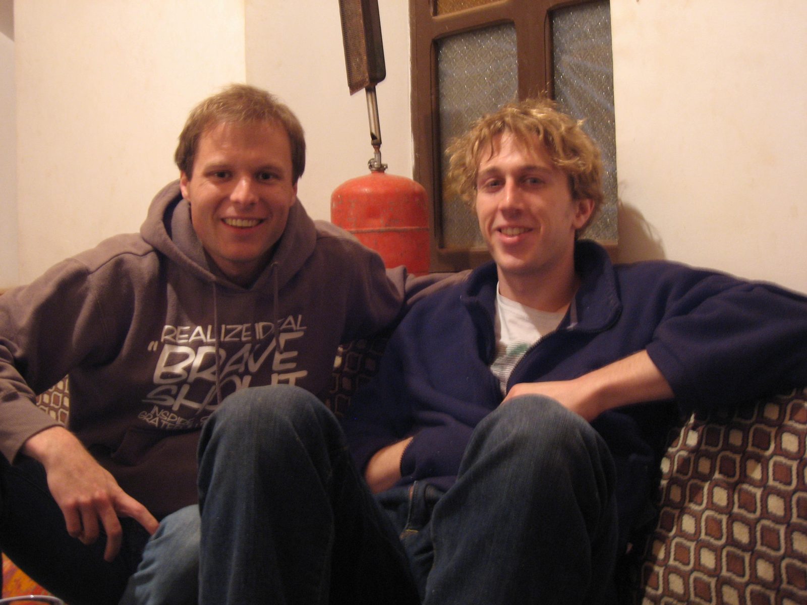 John and Trevor waiting to be served supper, and trying to read "Unterwasser" an awesome German...