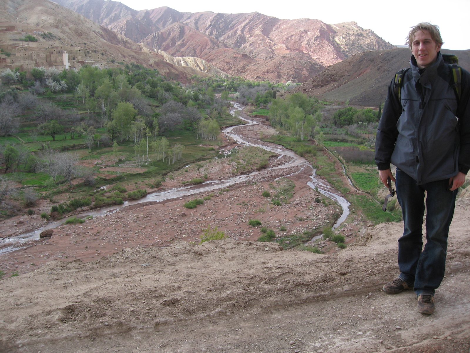 Trevor with our guide's village in the background.