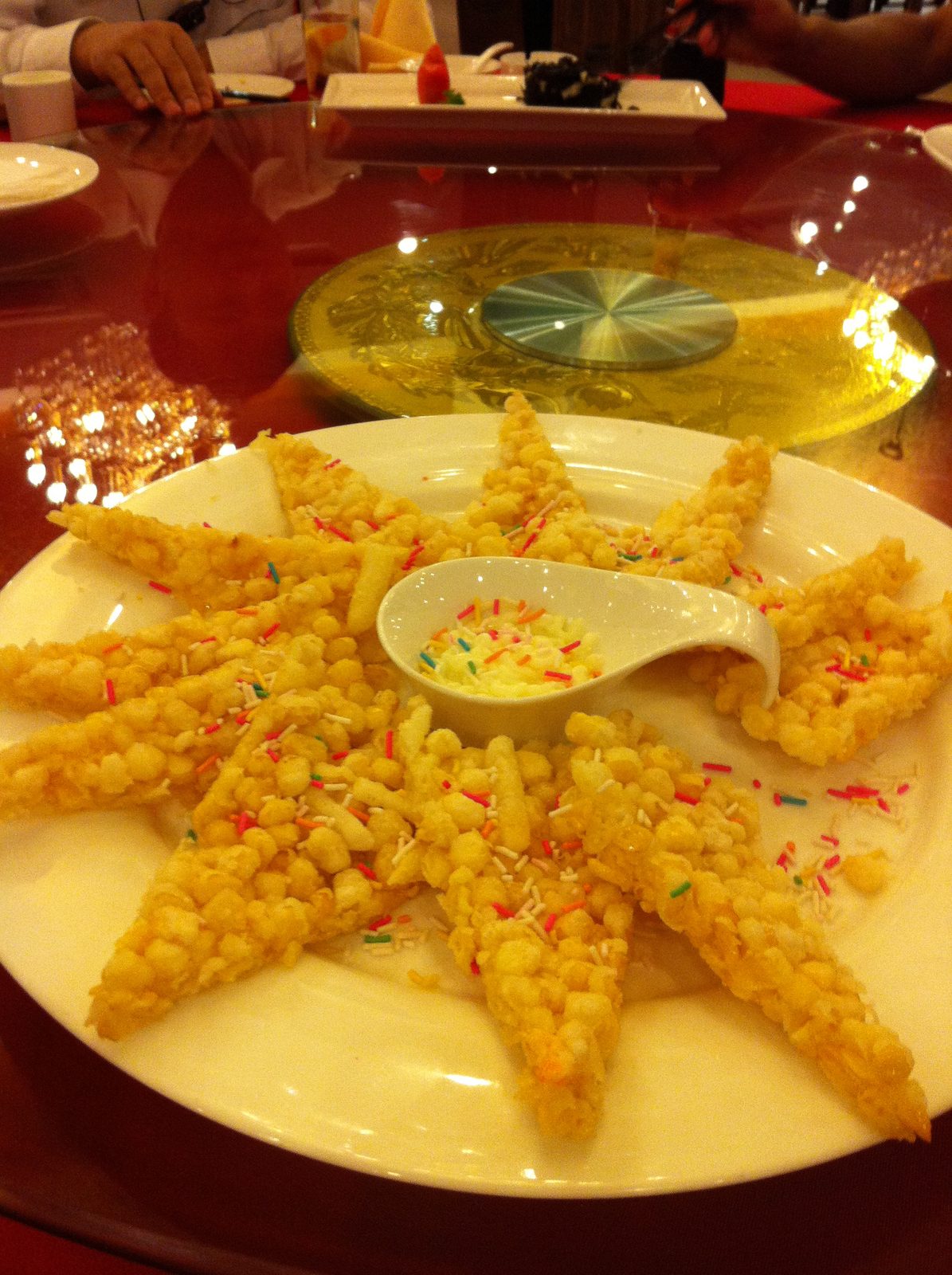 I'm always fascinated by fancy food around the world. Here we have apple and corn fritters...