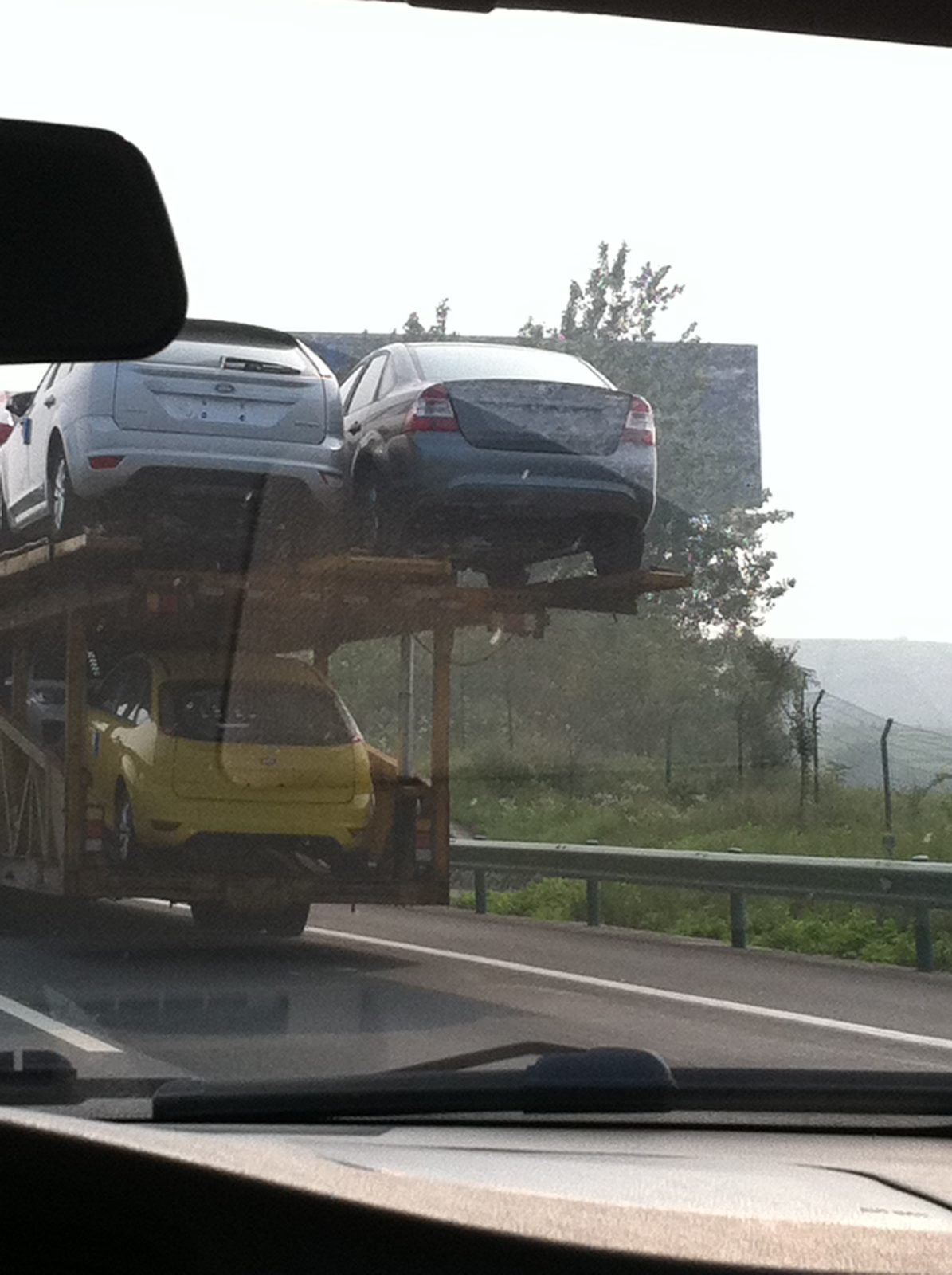 Double-wide car carrier. Never seen these in the U.S. Only the upper deck carried cars two-wide,...