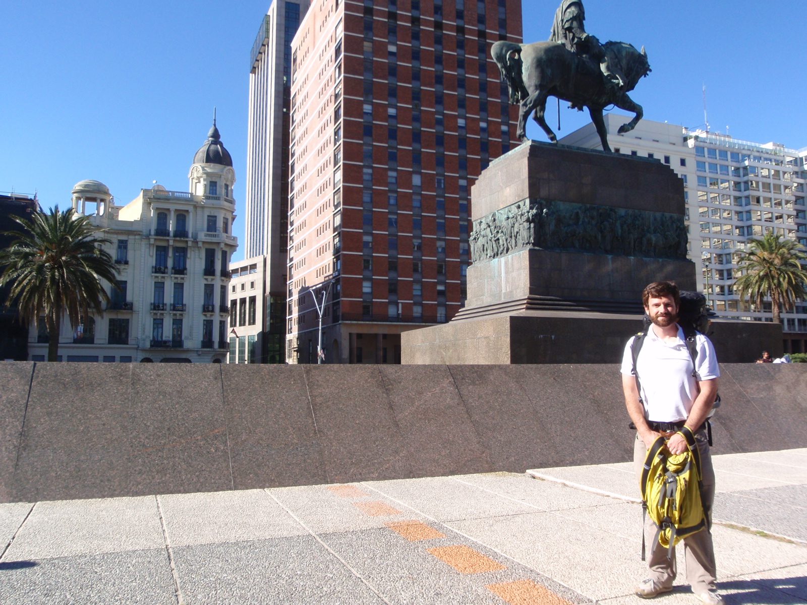 Jay in the Plaza Indepencia in front of the tomb of General Artigas, the "father" of Uruguay. ...