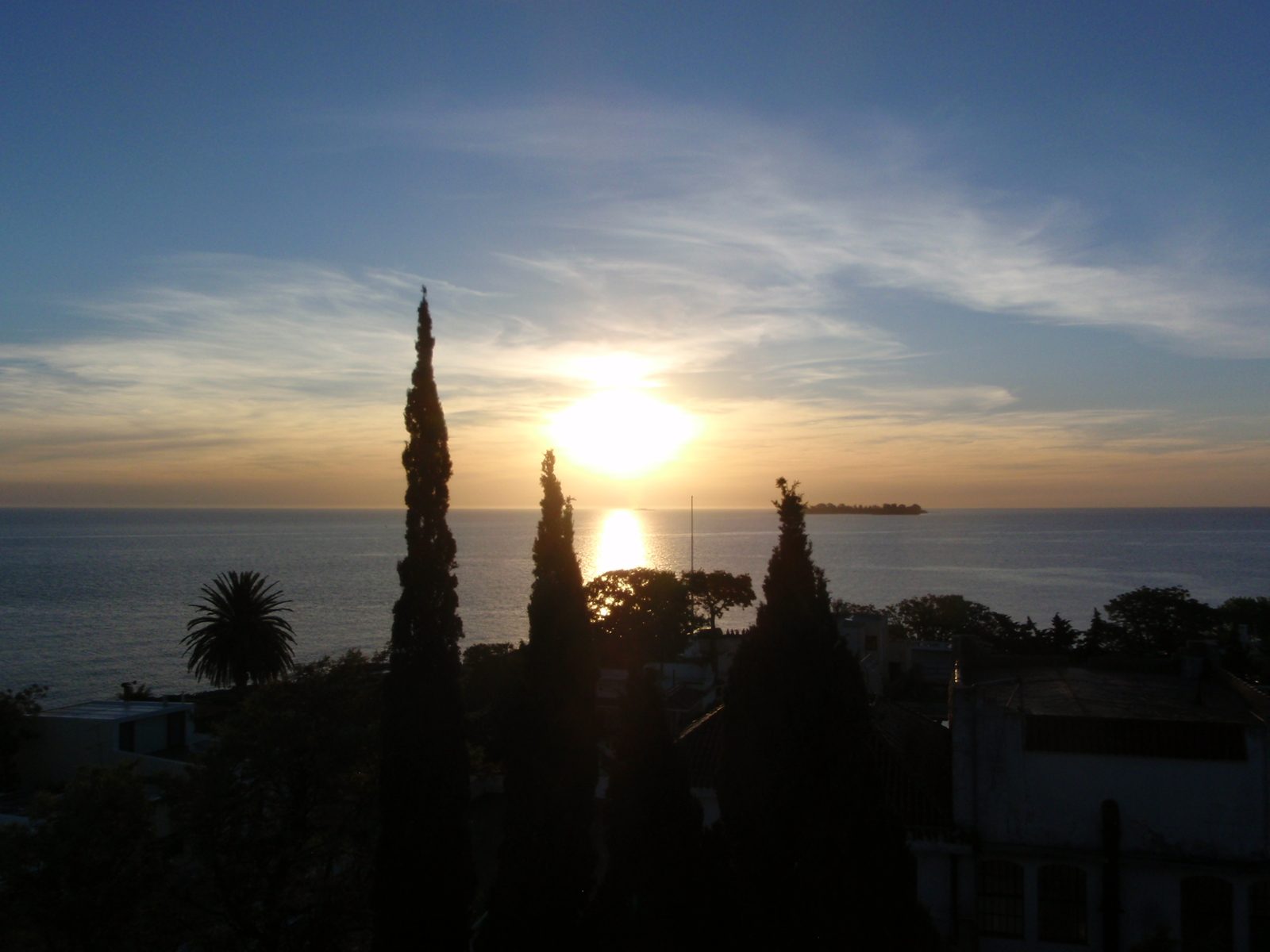 Here it is at last, the sun dropping into the Ria Plata, almost directly on top of Buenos Aires,...