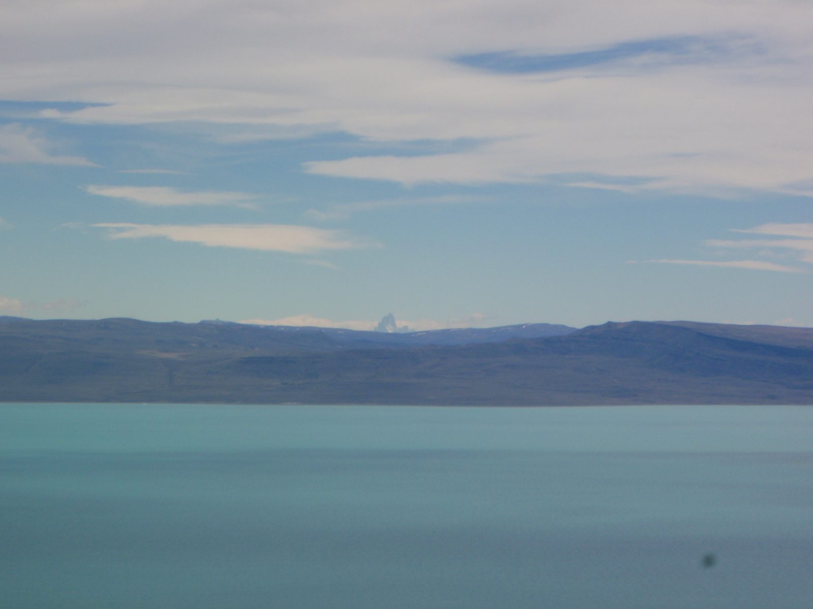 Cerro Fitz Roy rears it's 11,000 foot head from over 200 km away.  A very rare sighting as it's...